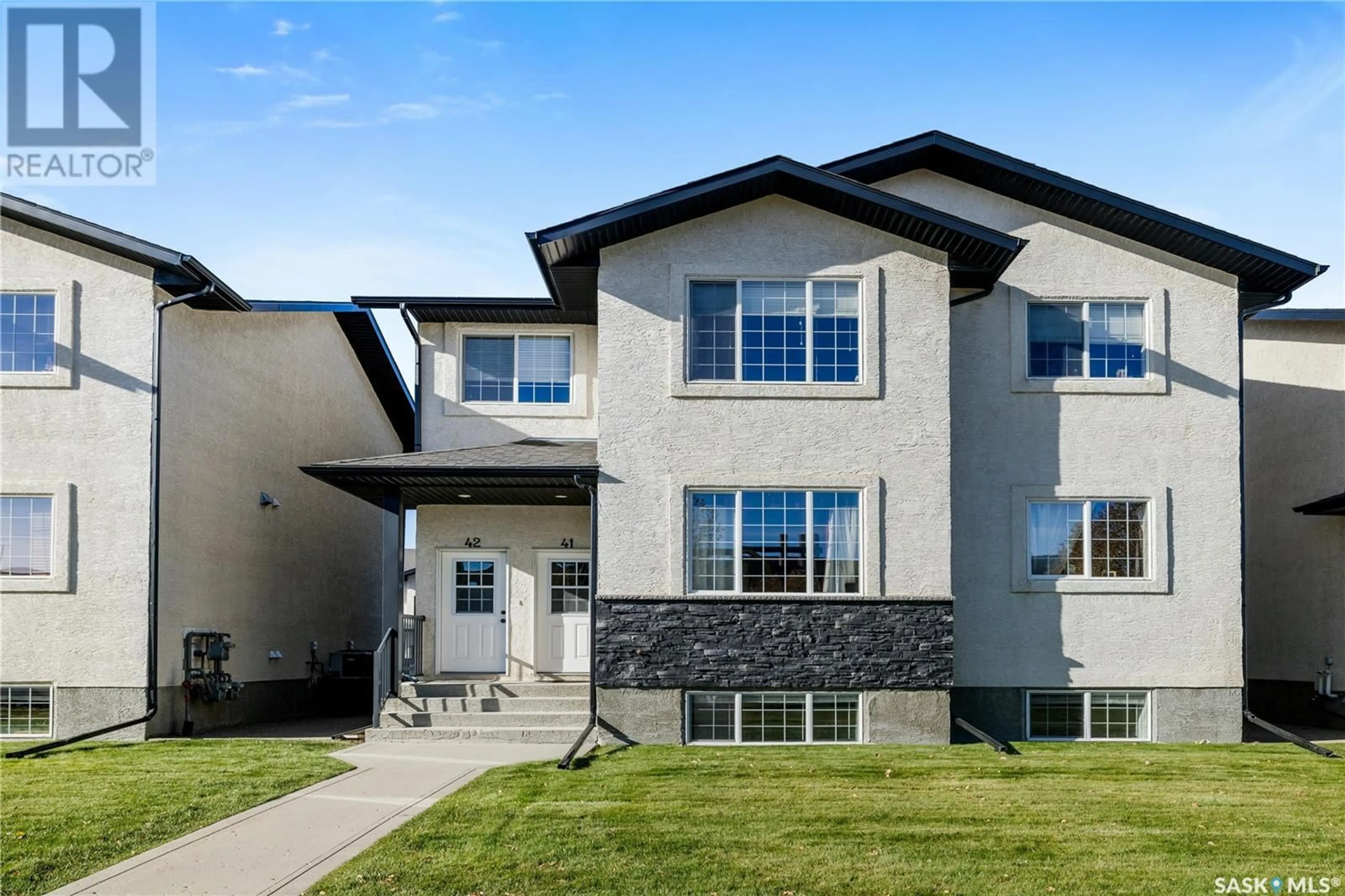 Frontside or backside of a home, the front or back of building for 42 4640 Harbour Landing DRIVE, Regina Saskatchewan S4W0B8