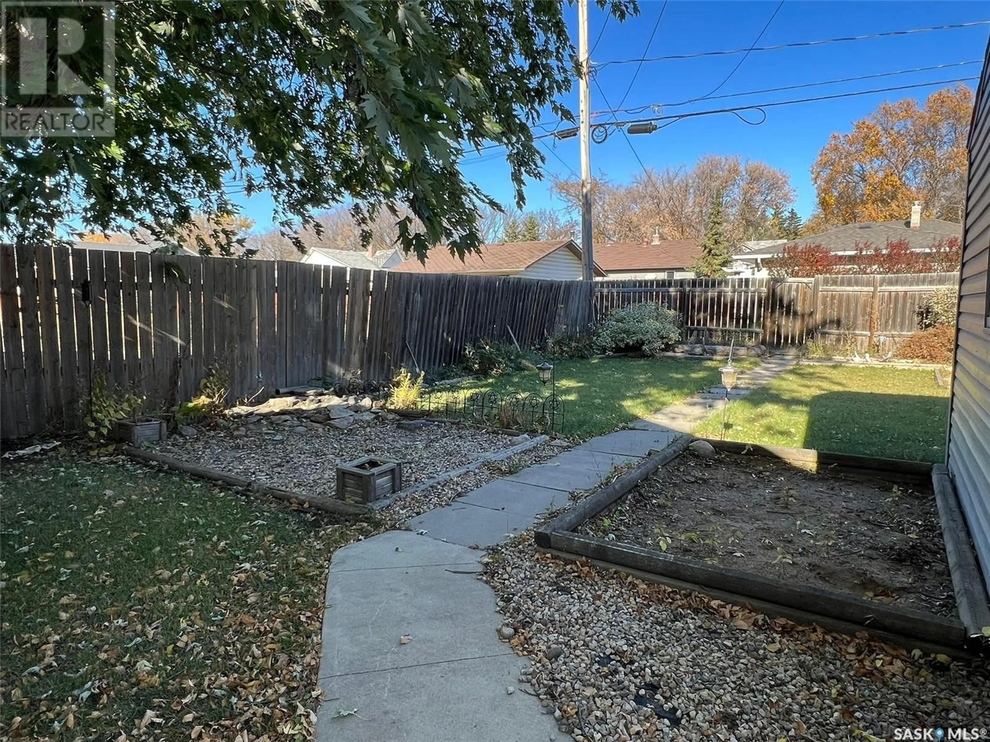 Patio, the fenced backyard for 420 Burrows AVENUE E, Melfort Saskatchewan S0E1A0