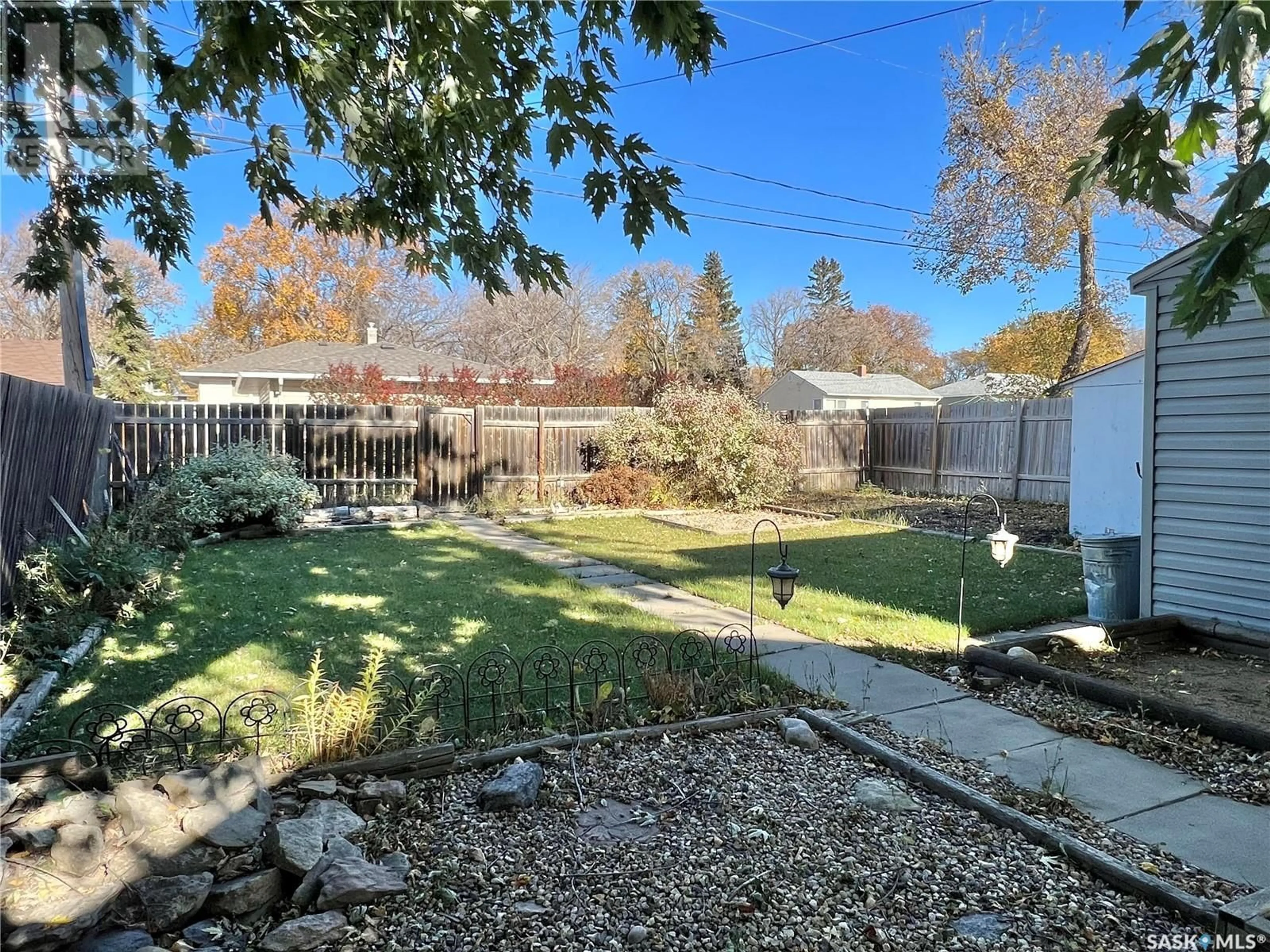 Patio, the fenced backyard for 420 Burrows AVENUE E, Melfort Saskatchewan S0E1A0