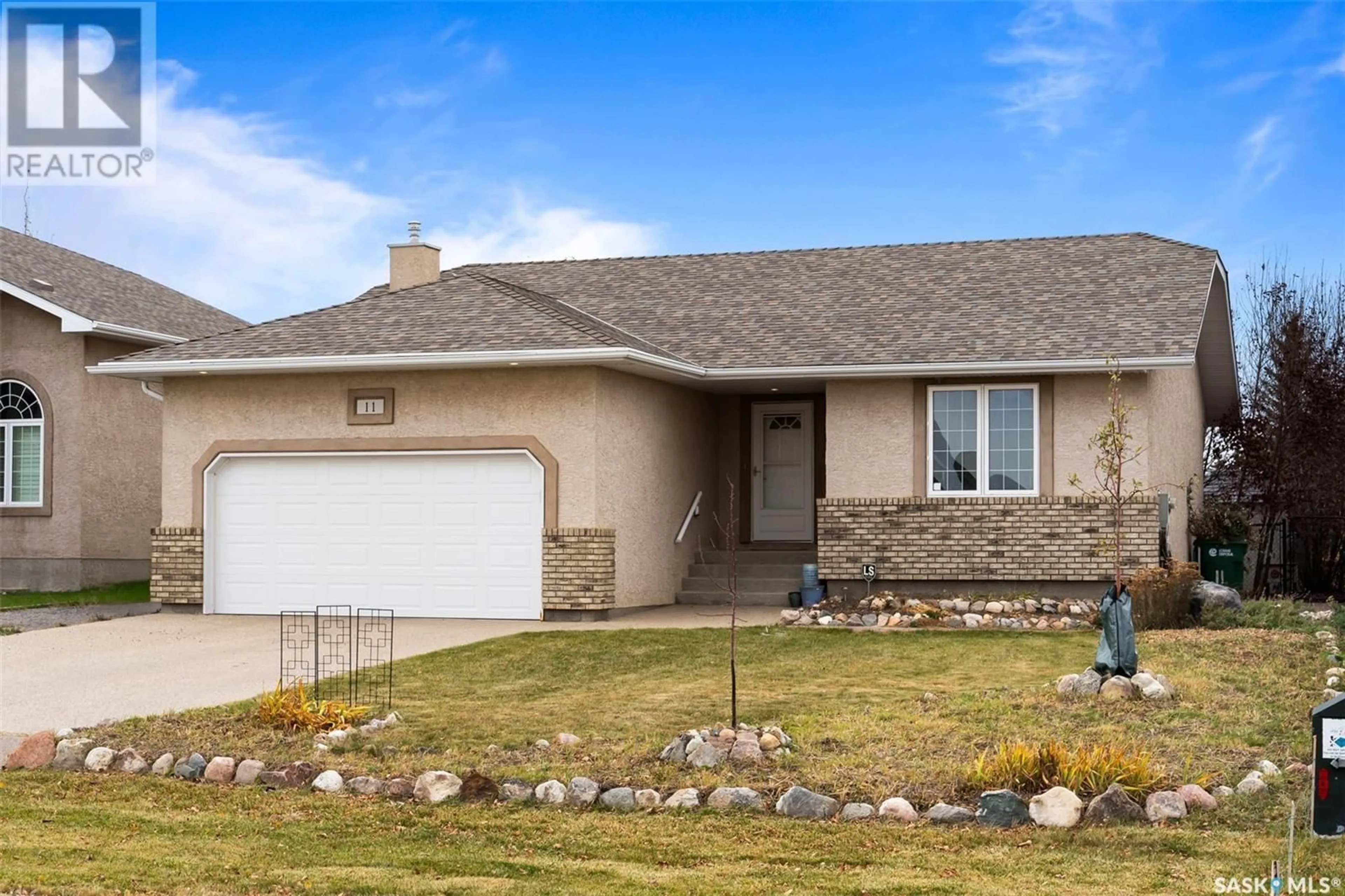 Frontside or backside of a home, cottage for 11 Woods CRESCENT, Emerald Park Saskatchewan S4L1C4