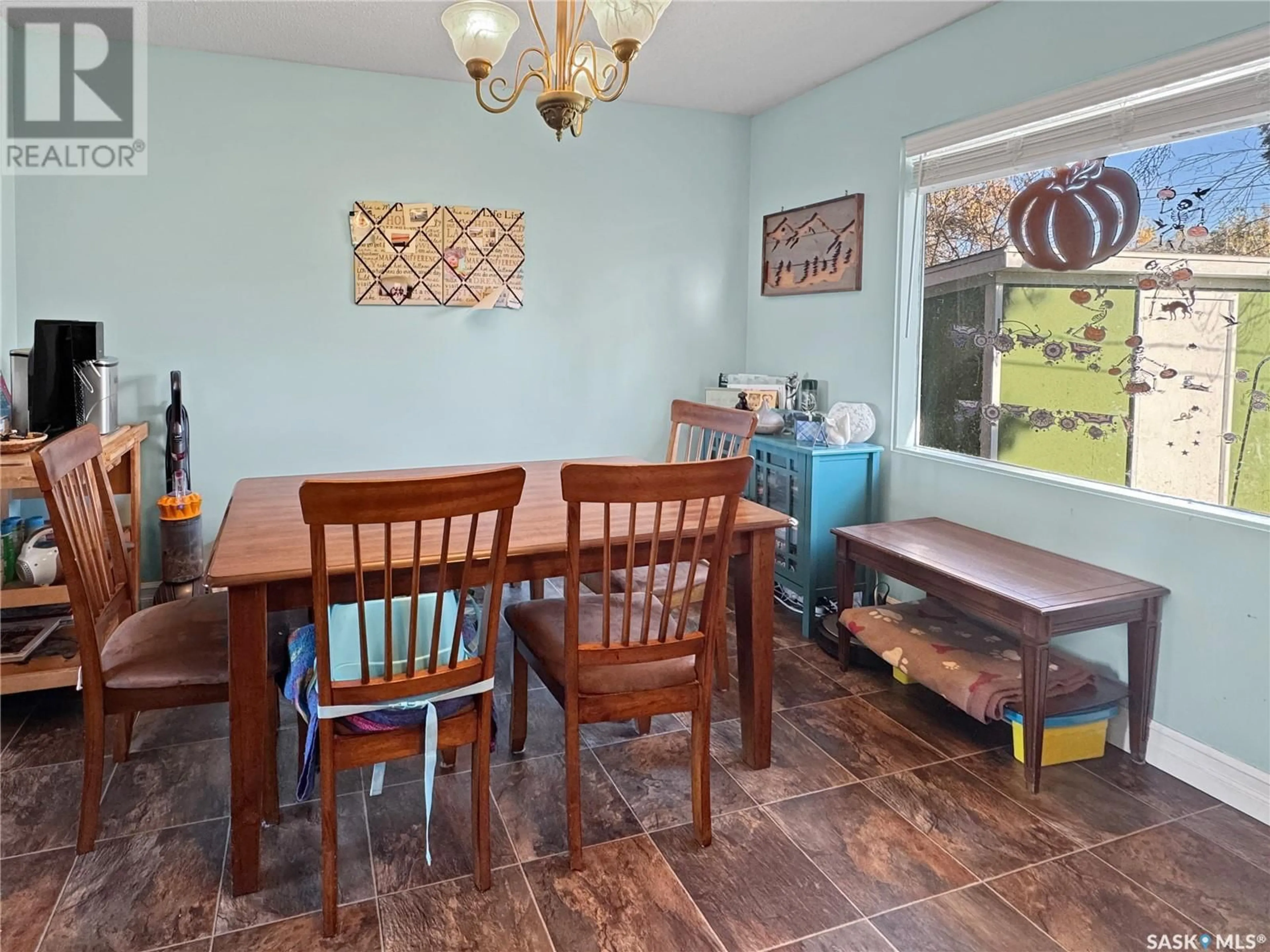 Dining room, wood floors, cottage for 572 100th STREET, North Battleford Saskatchewan S9A0T4