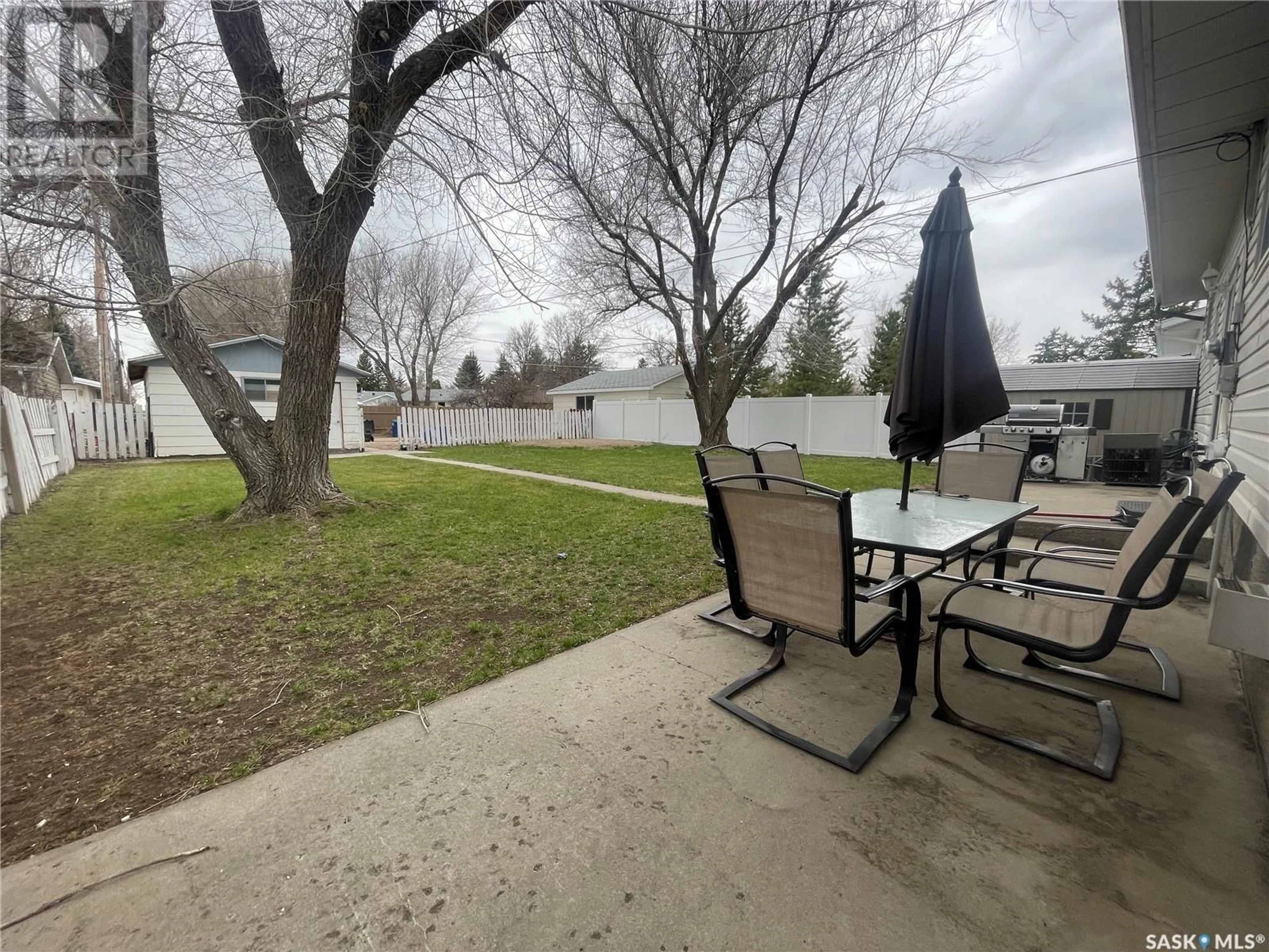 Patio, the fenced backyard for 735 Jasper STREET, Maple Creek Saskatchewan S0N1N0