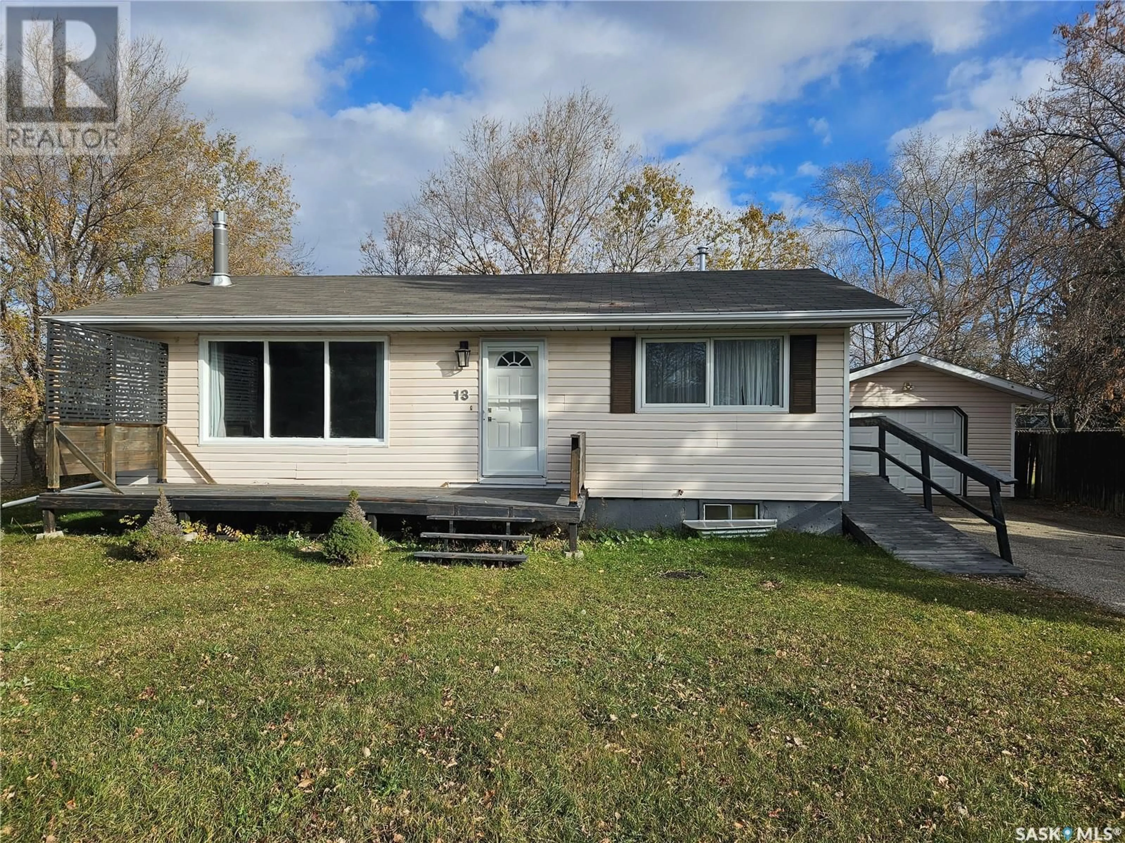 Frontside or backside of a home, cottage for 13 Mountain DRIVE, Carlyle Saskatchewan S0C0R0