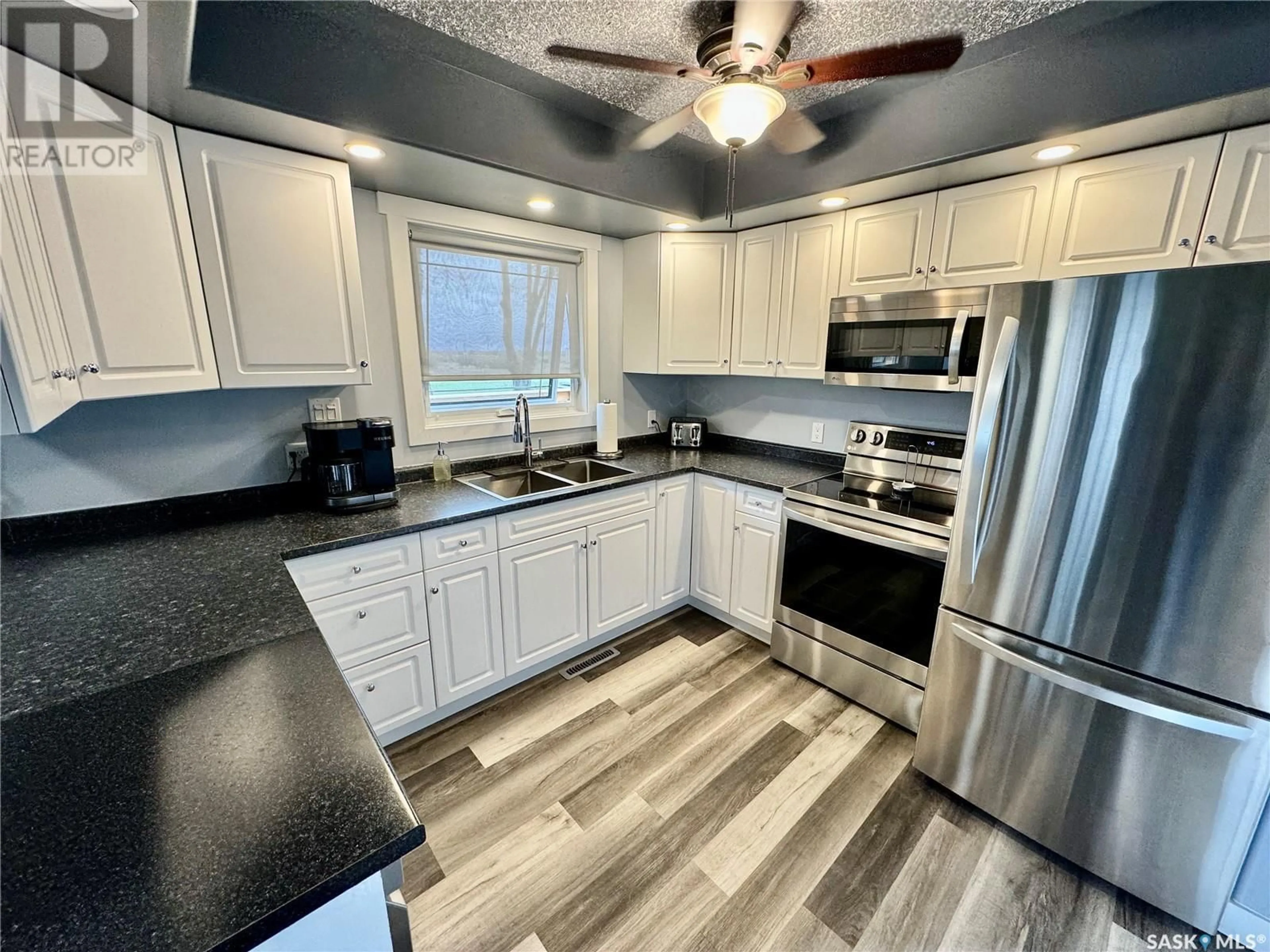 Open concept kitchen for 302 2nd AVENUE E, Buchanan Saskatchewan S0A0J0