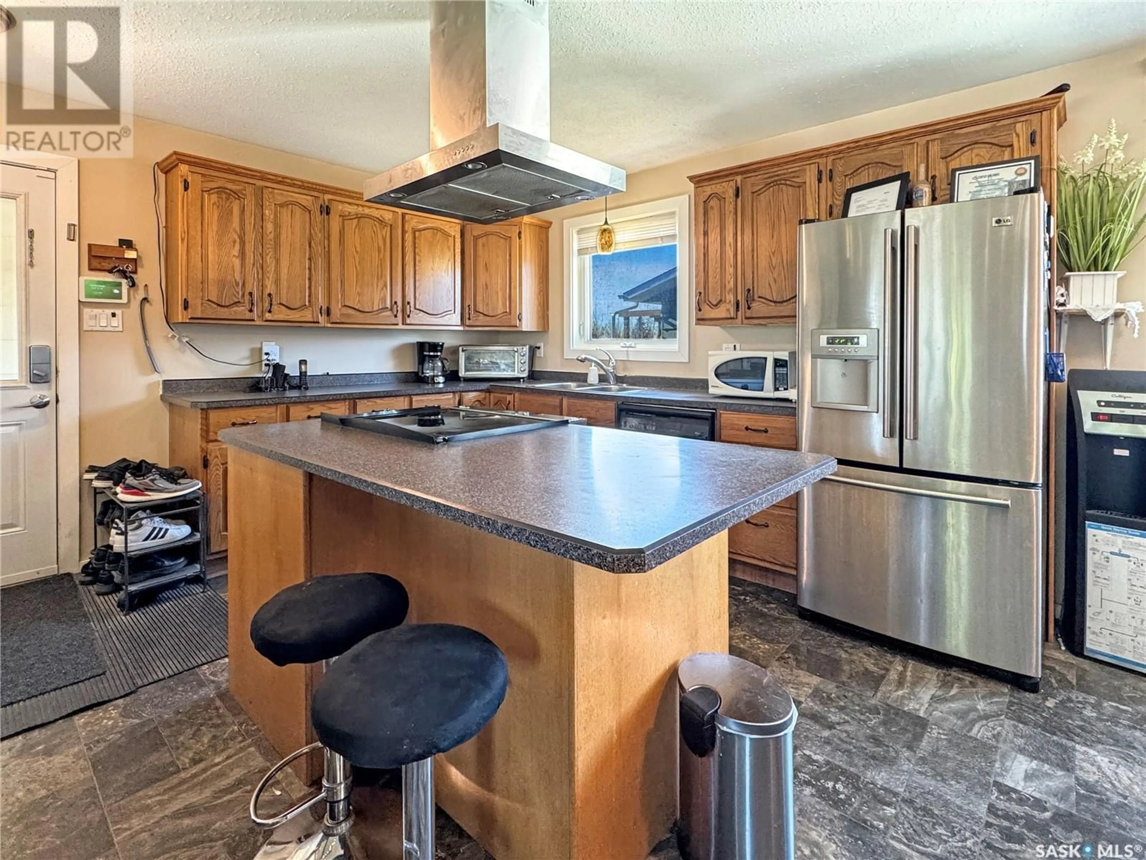 Open concept kitchen for 9408 Meadow Lark LANE, North Battleford Saskatchewan S9A3V3