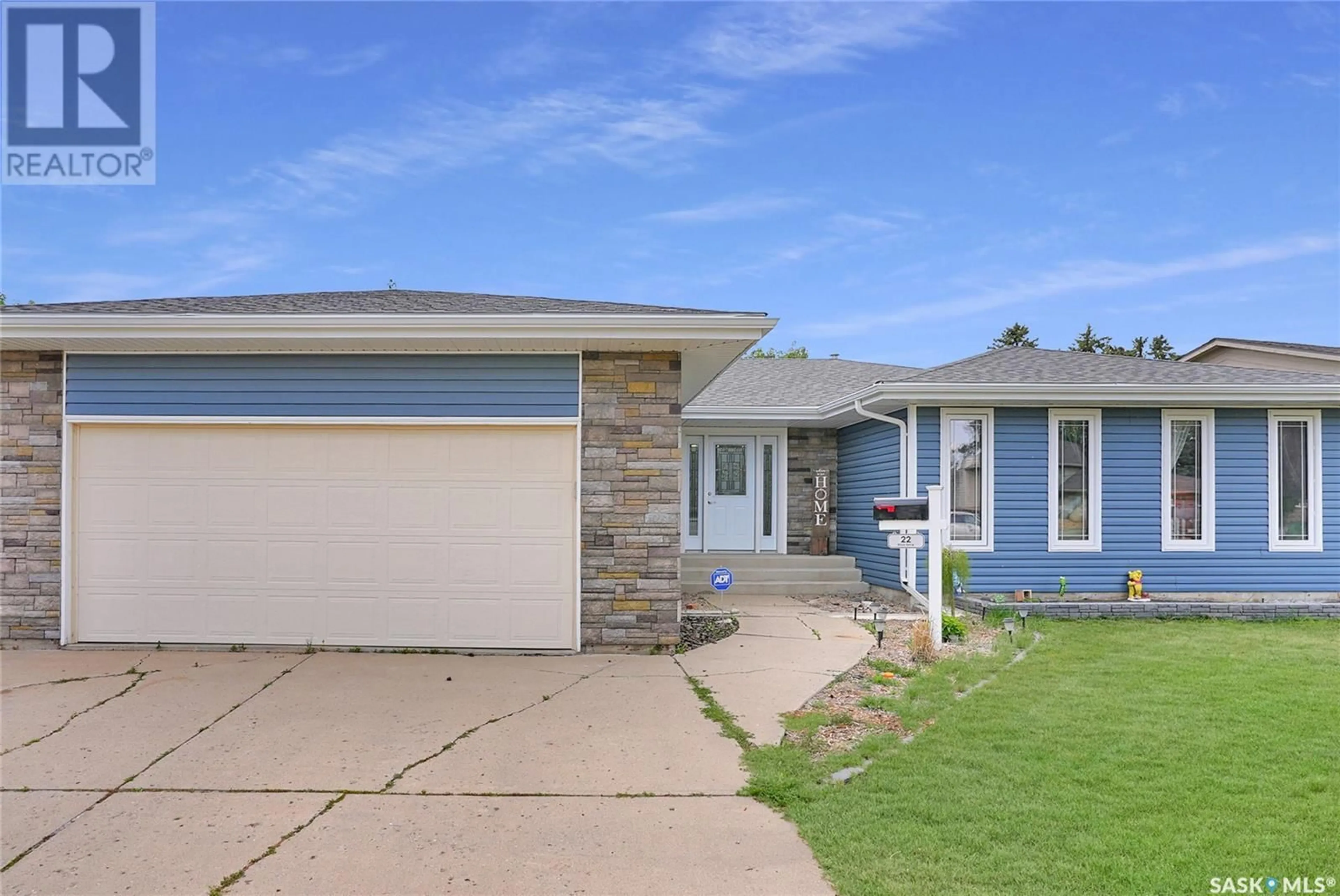 Frontside or backside of a home, the street view for 22 Elisia DRIVE, Moose Jaw Saskatchewan S6J1G9