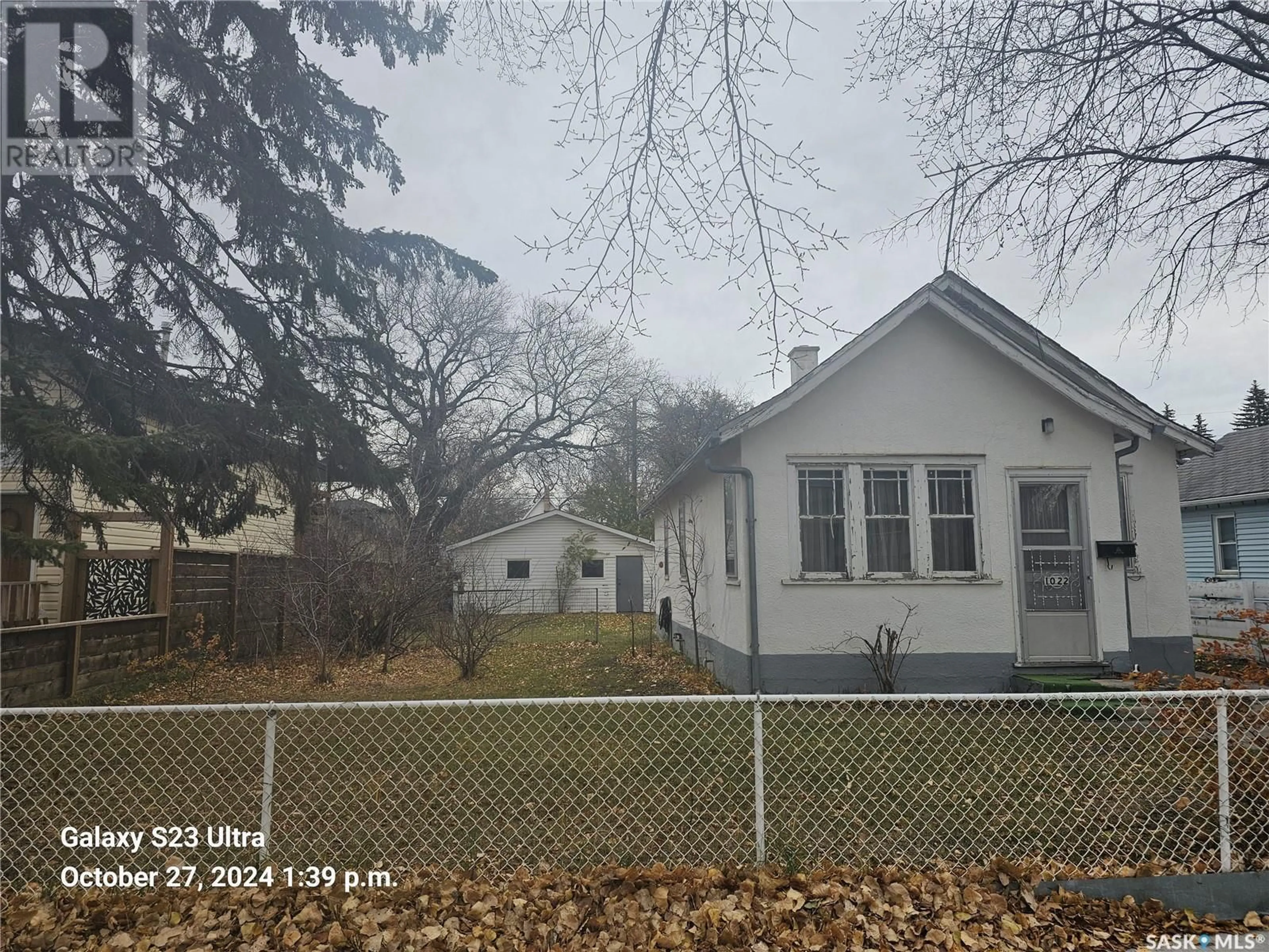 Frontside or backside of a home, the street view for 1022 K AVENUE S, Saskatoon Saskatchewan S7L0T6