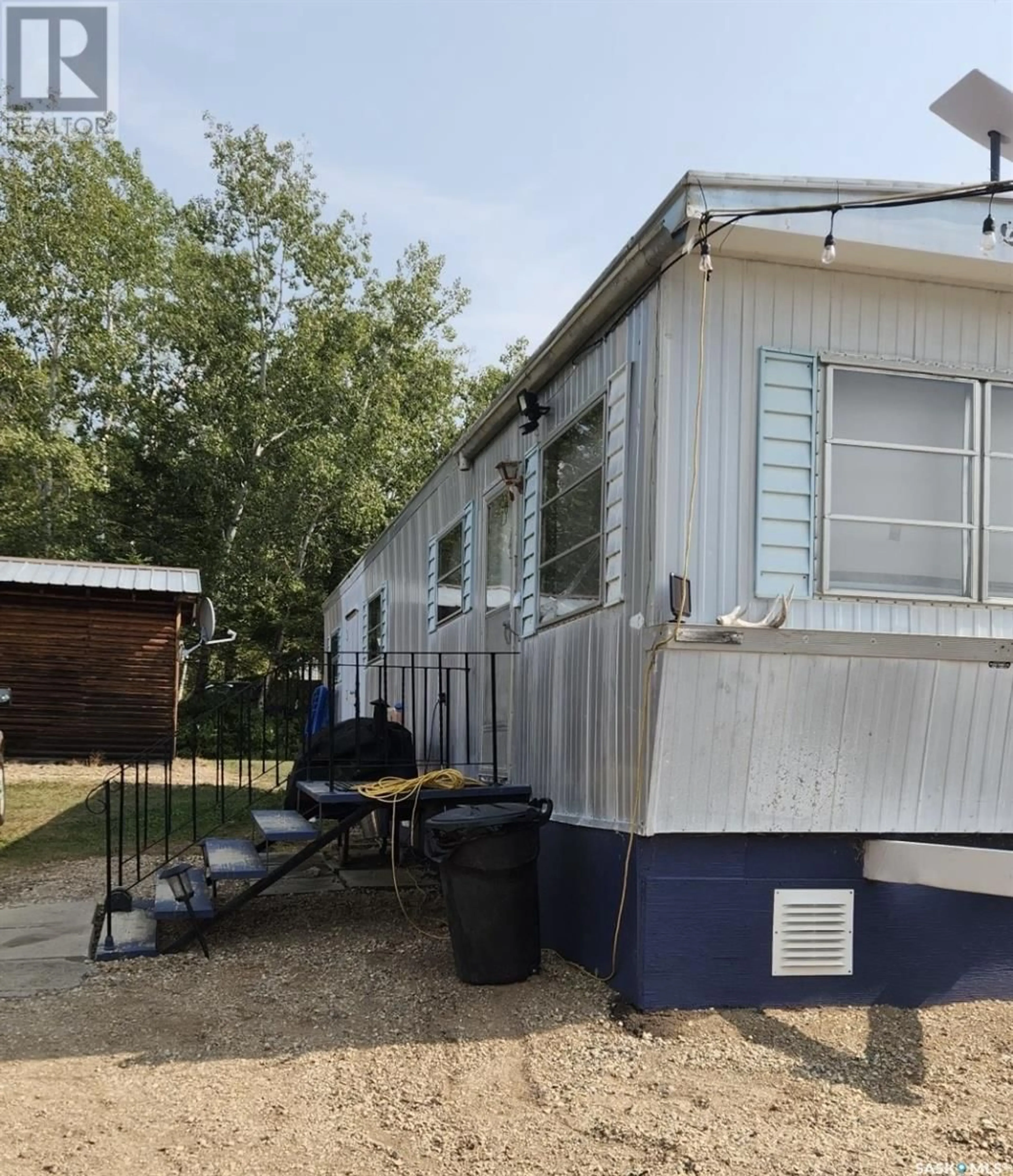 A pic from exterior of the house or condo, the street view for 706 Thompson AVENUE, Hudson Bay Rm No. 394 Saskatchewan S0E0Y0