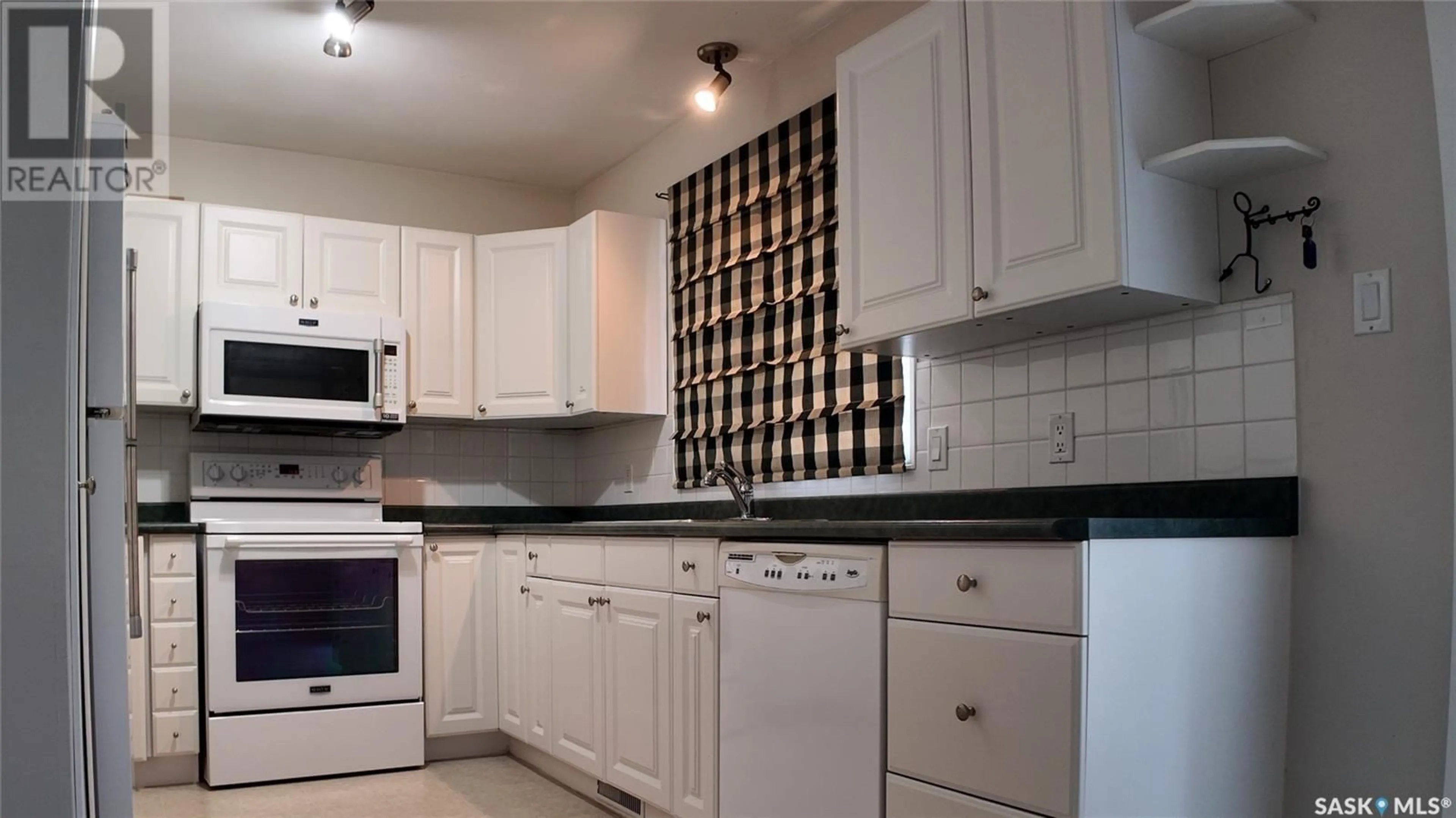 Standard kitchen, ceramic floors, cottage for 2128 101st CRESCENT, North Battleford Saskatchewan S9A1C3