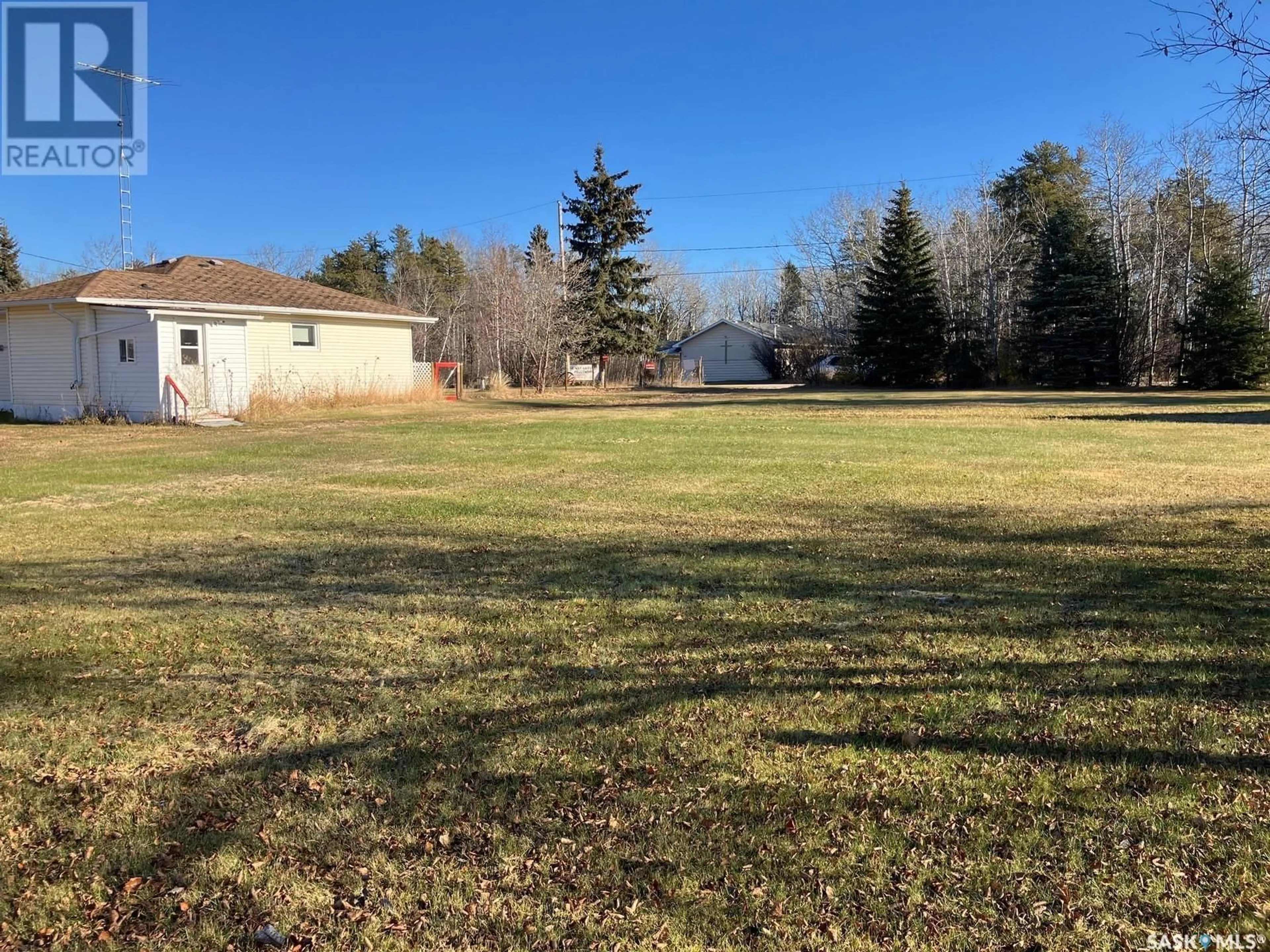 Frontside or backside of a home, the fenced backyard for 310 Hanson Lake ROAD, Smeaton Saskatchewan S0J2J0