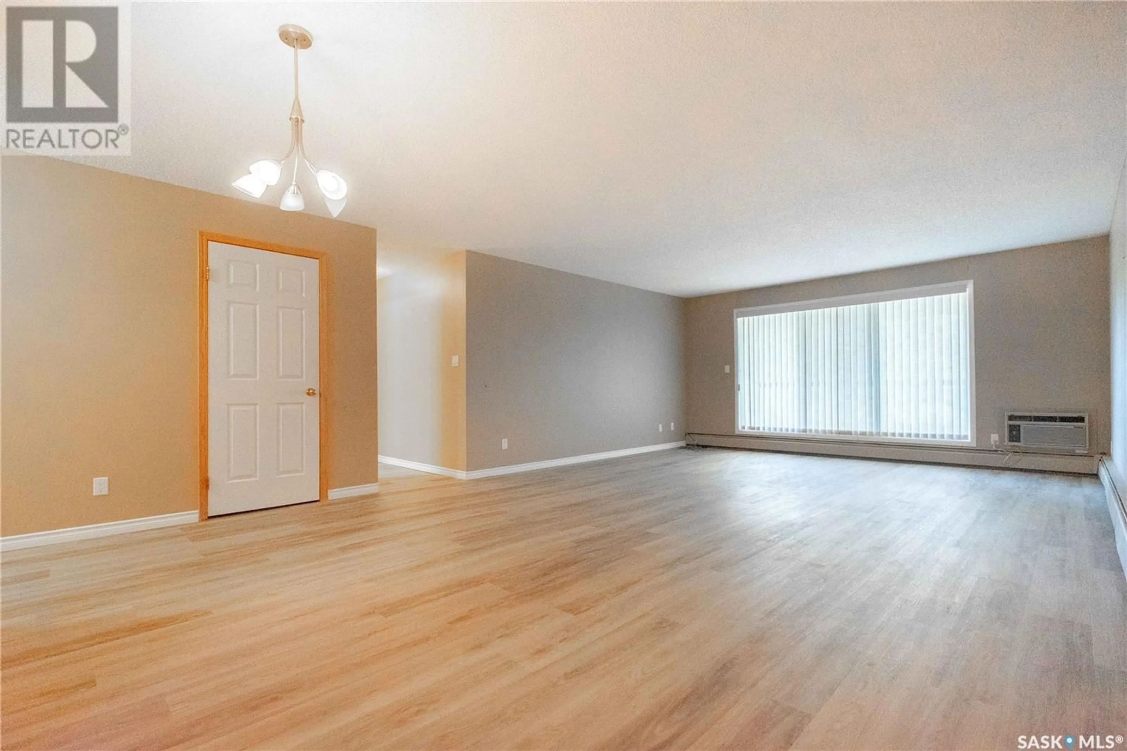 A pic of a room, wood floors for 205 2160 Cornwall STREET, Regina Saskatchewan S4P2K7