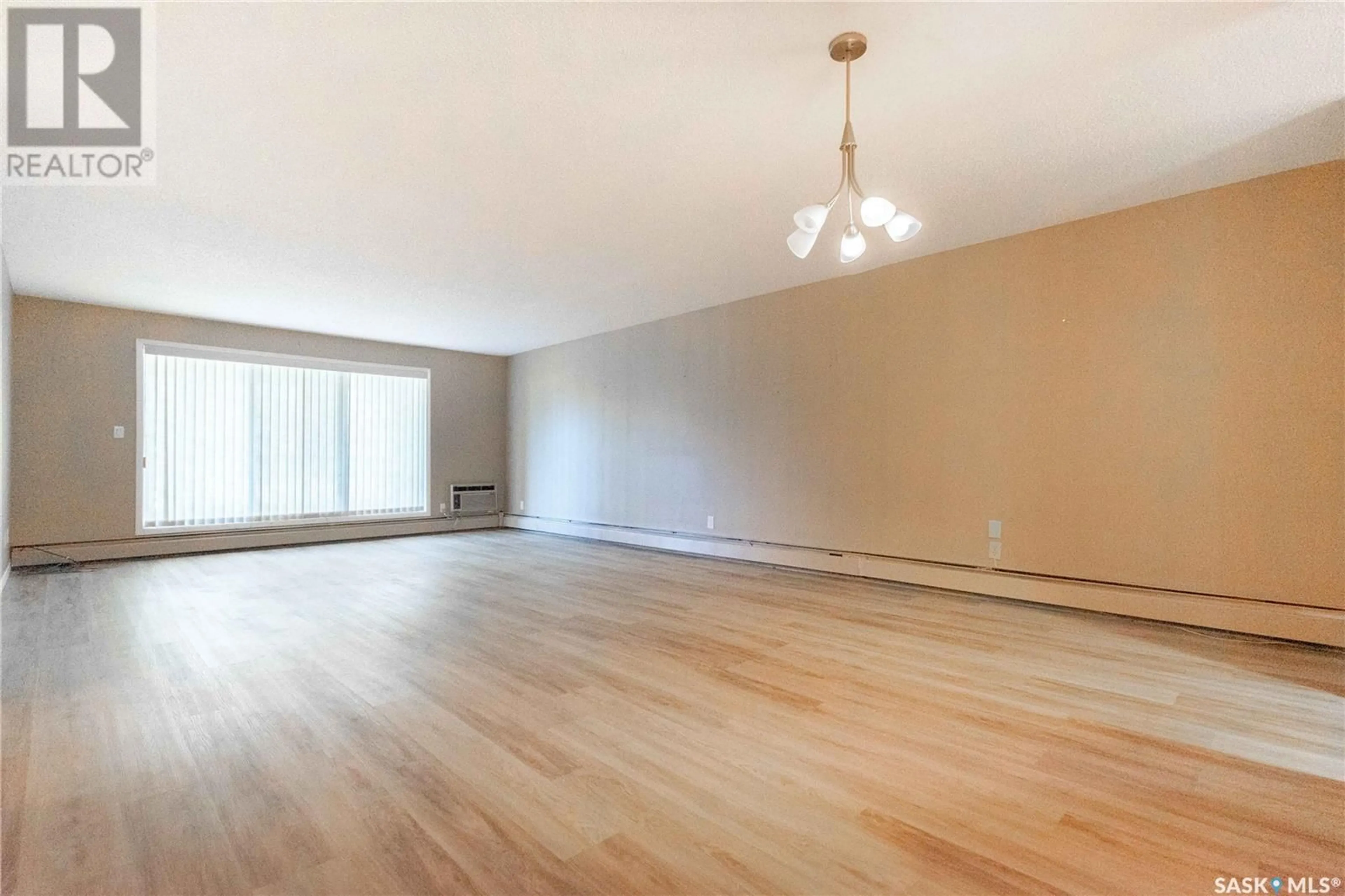 A pic of a room, wood floors for 205 2160 Cornwall STREET, Regina Saskatchewan S4P2K7