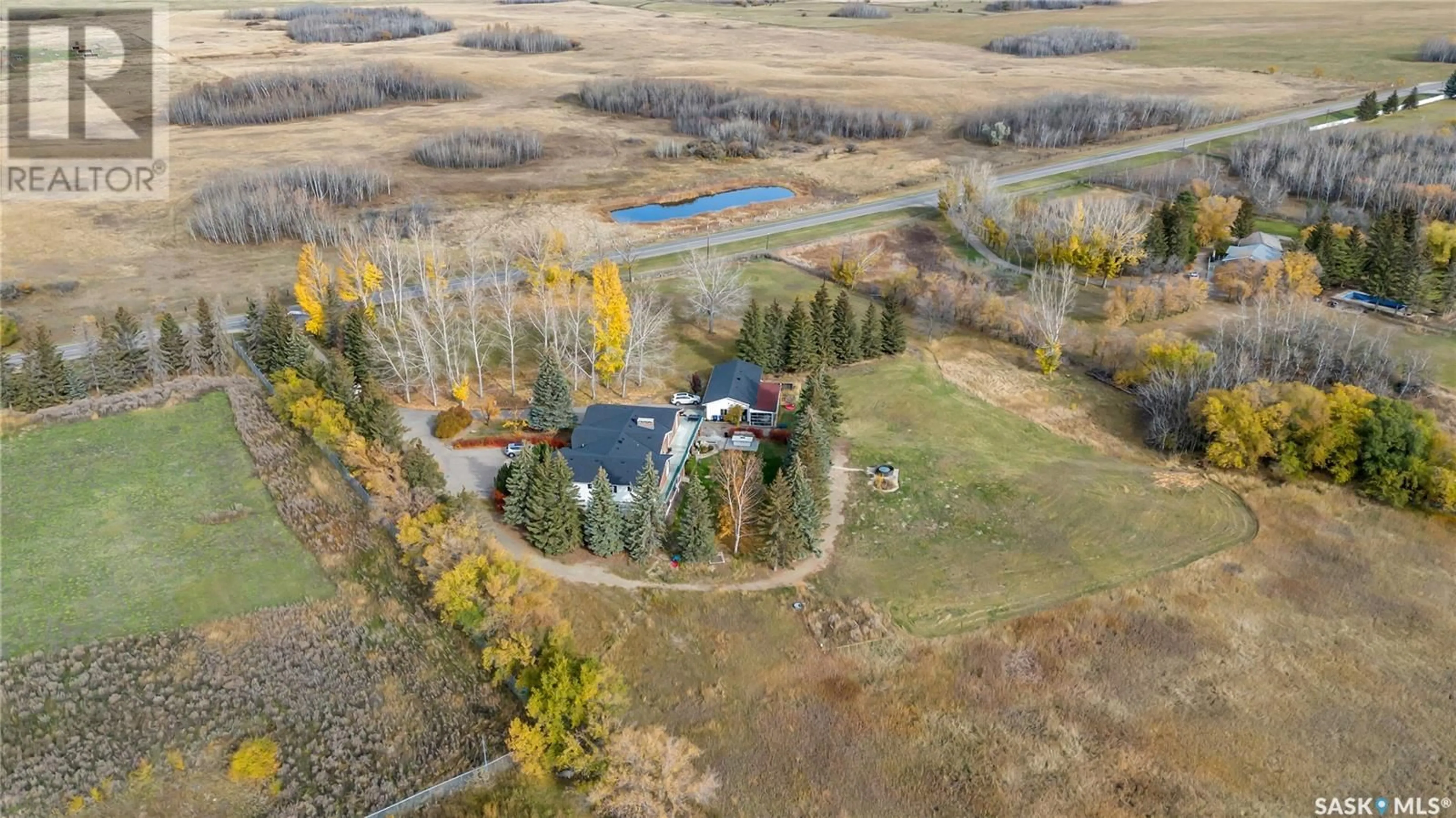 A pic from outside/outdoor area/front of a property/back of a property/a pic from drone, unknown for 280 GRASSWOOD ROAD, Grasswood Saskatchewan S7T1A9