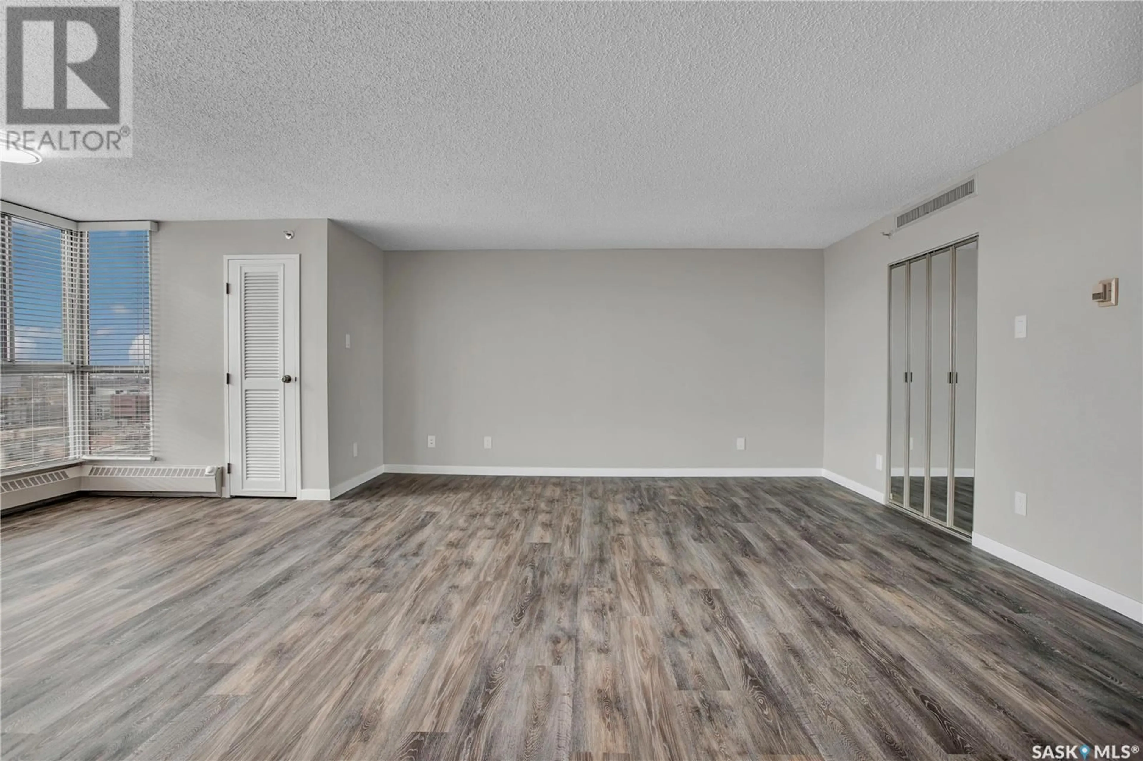 A pic of a room, wood floors for 1806 315 5th AVENUE N, Saskatoon Saskatchewan S7K2P7