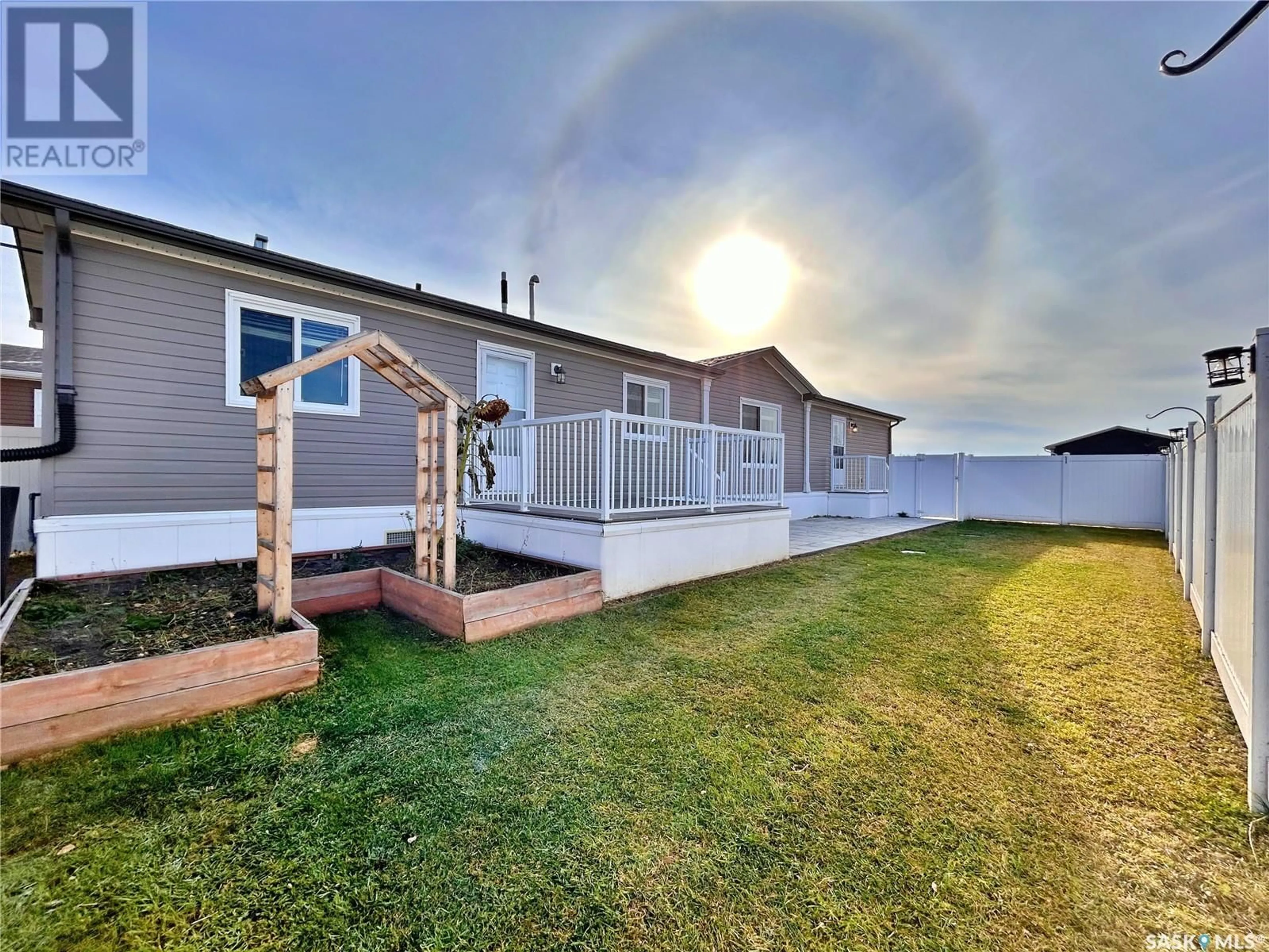 Frontside or backside of a home, the fenced backyard for 1206 Autumn COURT, Rocanville Saskatchewan S0A3L0