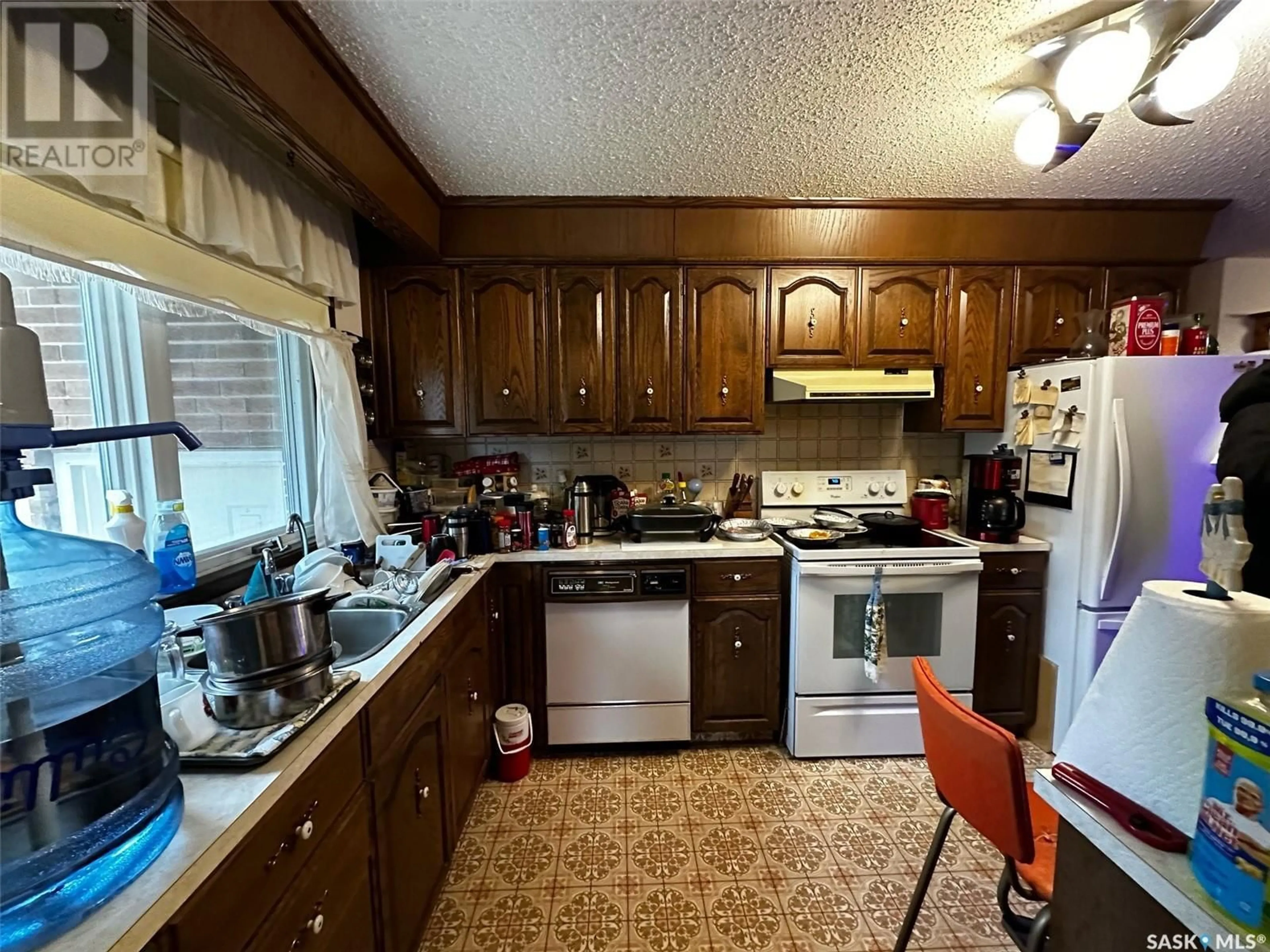 Kitchen, wood floors, cottage for 308 1st STREET E, Spiritwood Saskatchewan S0J2M0