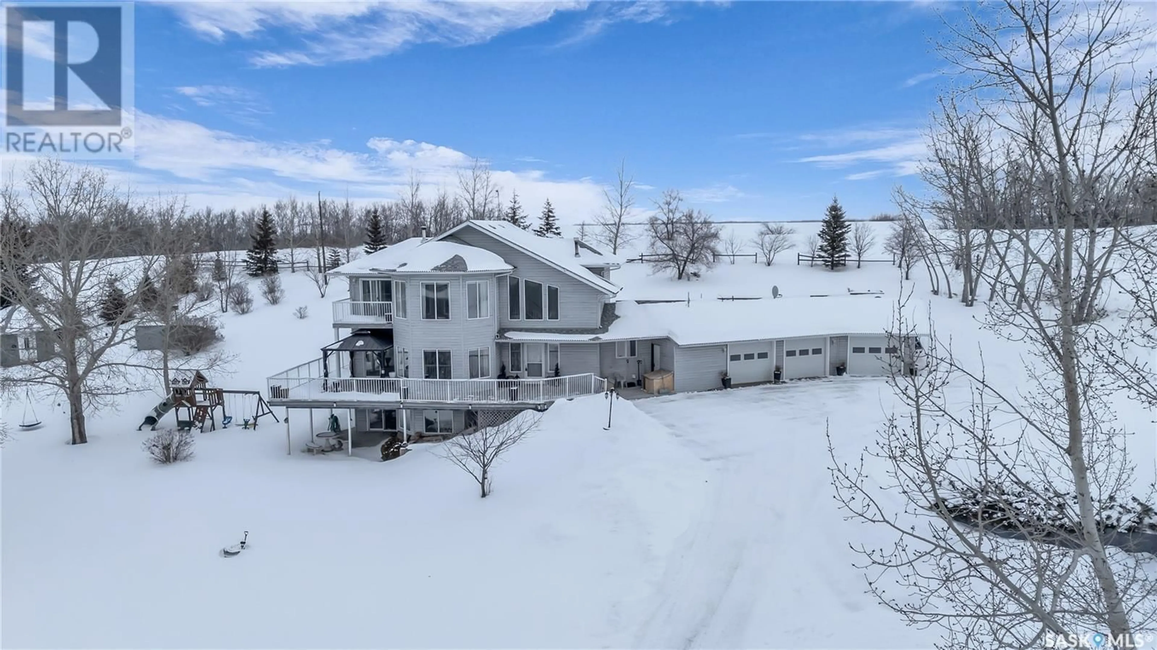 A pic from outside/outdoor area/front of a property/back of a property/a pic from drone, water/lake/river/ocean view for ISLAND VIEW ACREAGE, North Battleford Rm No. 437 Saskatchewan S9A2X4