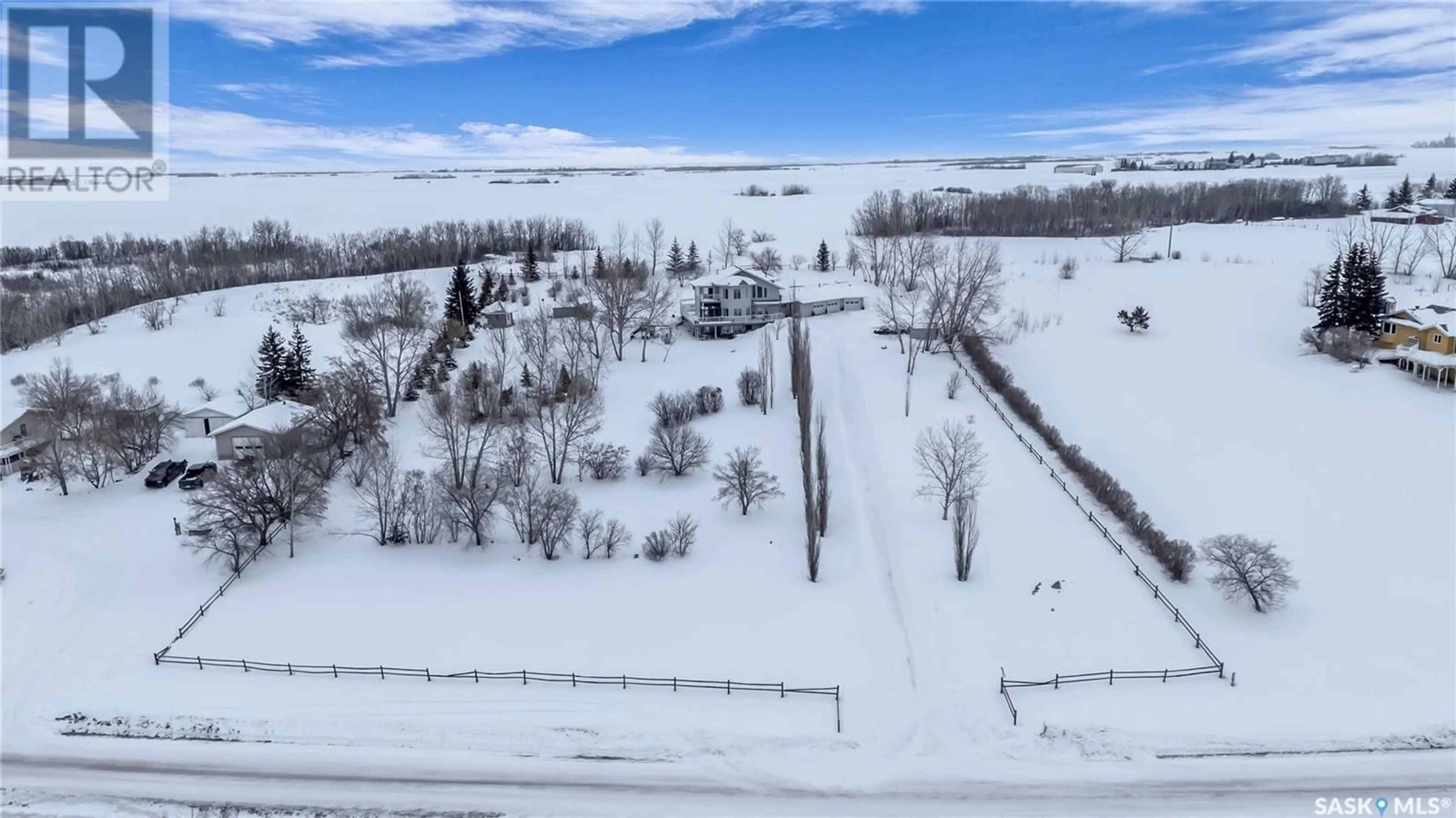 A pic from outside/outdoor area/front of a property/back of a property/a pic from drone, water/lake/river/ocean view for ISLAND VIEW ACREAGE, North Battleford Rm No. 437 Saskatchewan S9A2X4