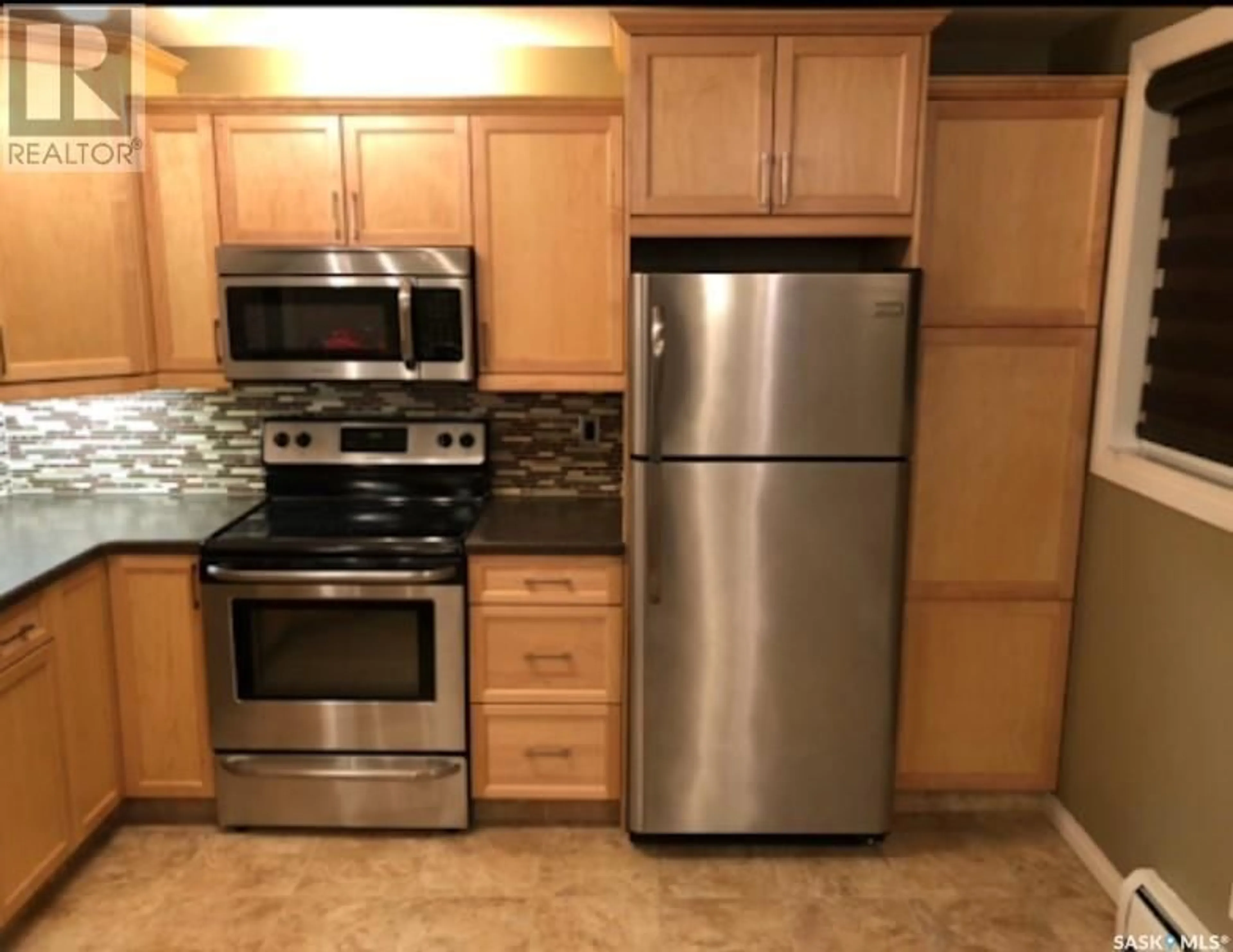 Standard kitchen, wood floors for 1 15 Coventry ROAD, Regina Saskatchewan S4T5Z4