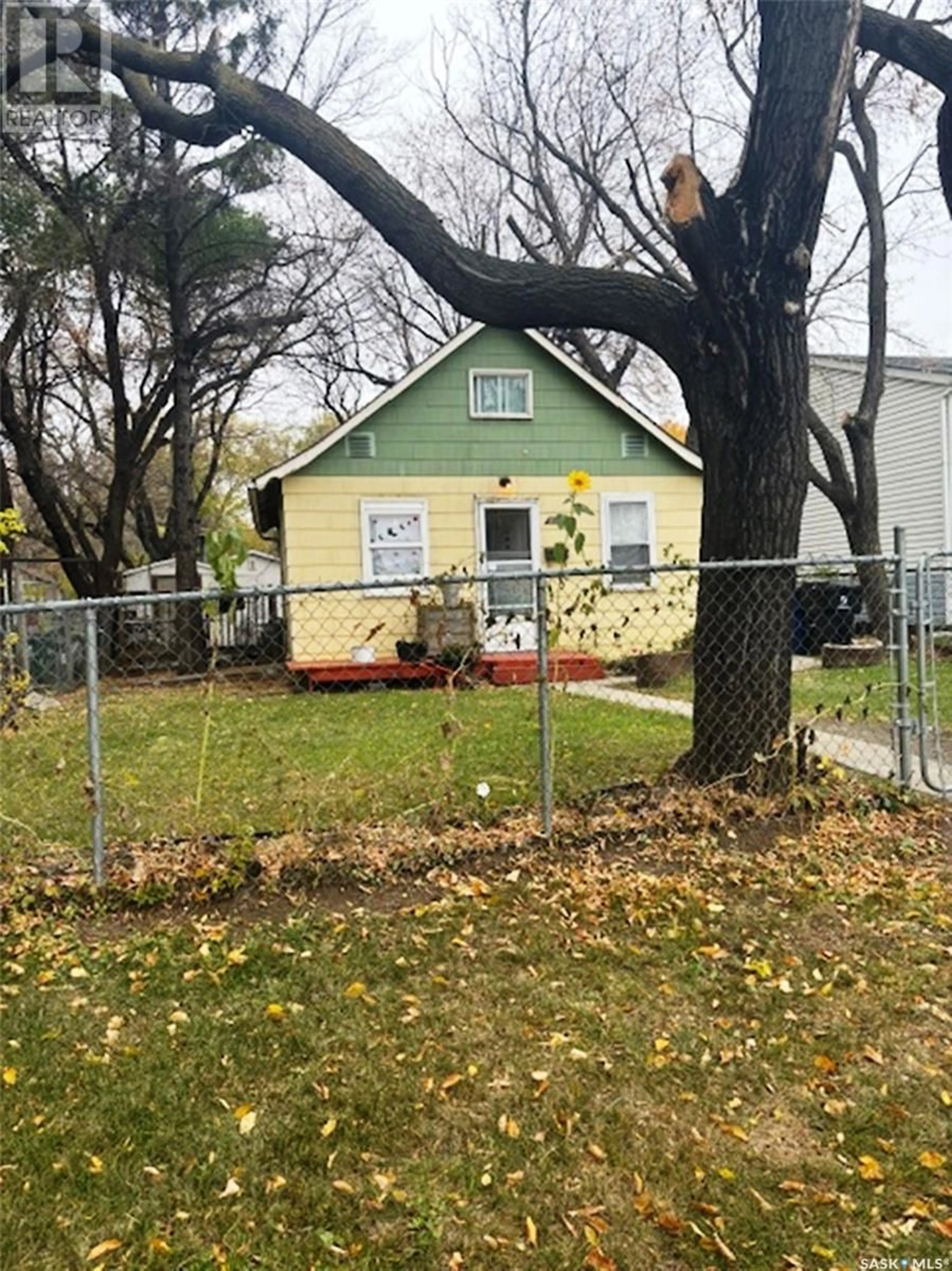 Frontside or backside of a home, the fenced backyard for 331 T AVENUE S, Saskatoon Saskatchewan S7M3A9