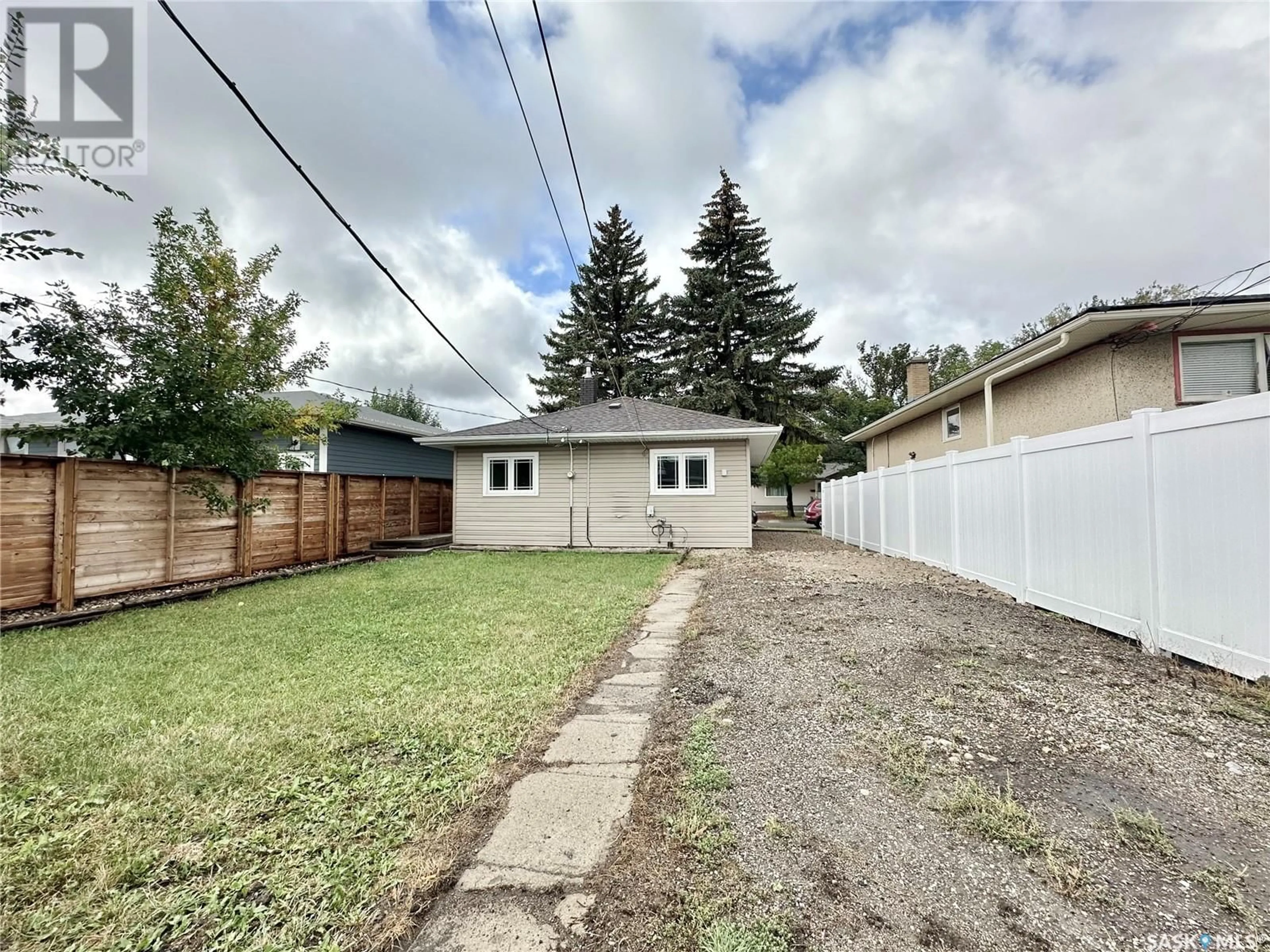 Frontside or backside of a home, the fenced backyard for 2125 Fleury STREET, Regina Saskatchewan S4N2M3