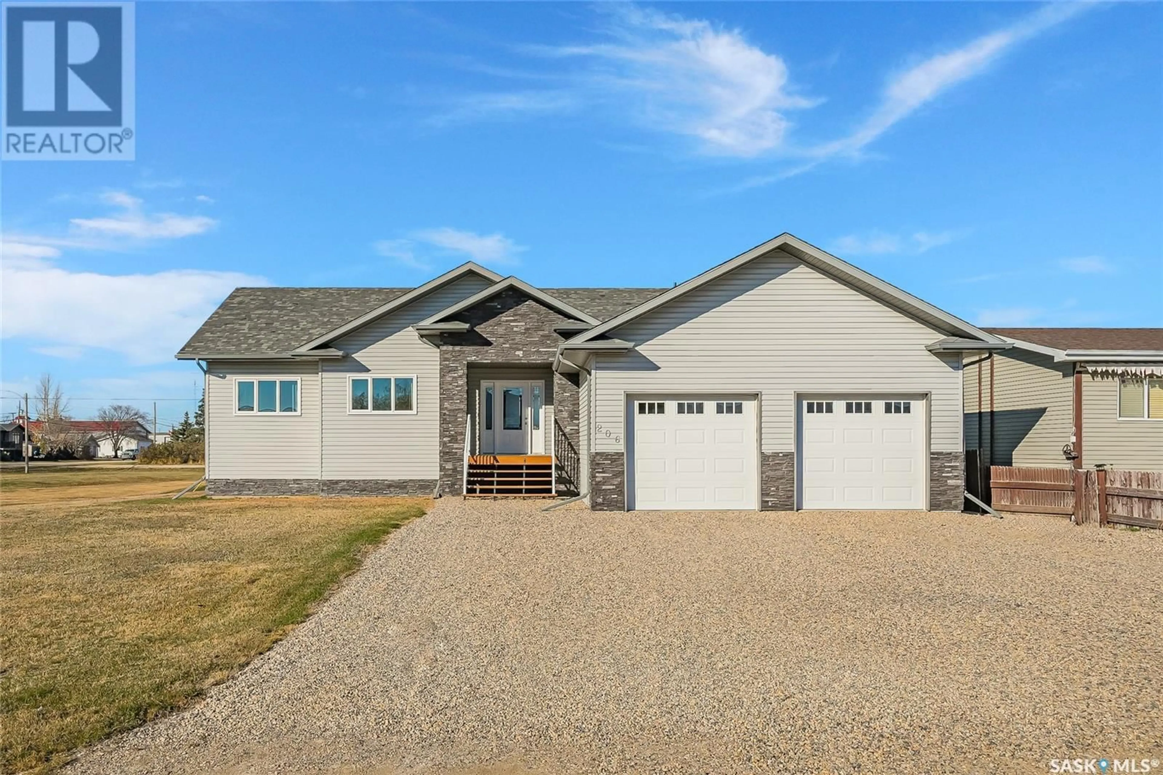 Frontside or backside of a home, cottage for 206 2nd AVENUE, Hanley Saskatchewan S0G2E0