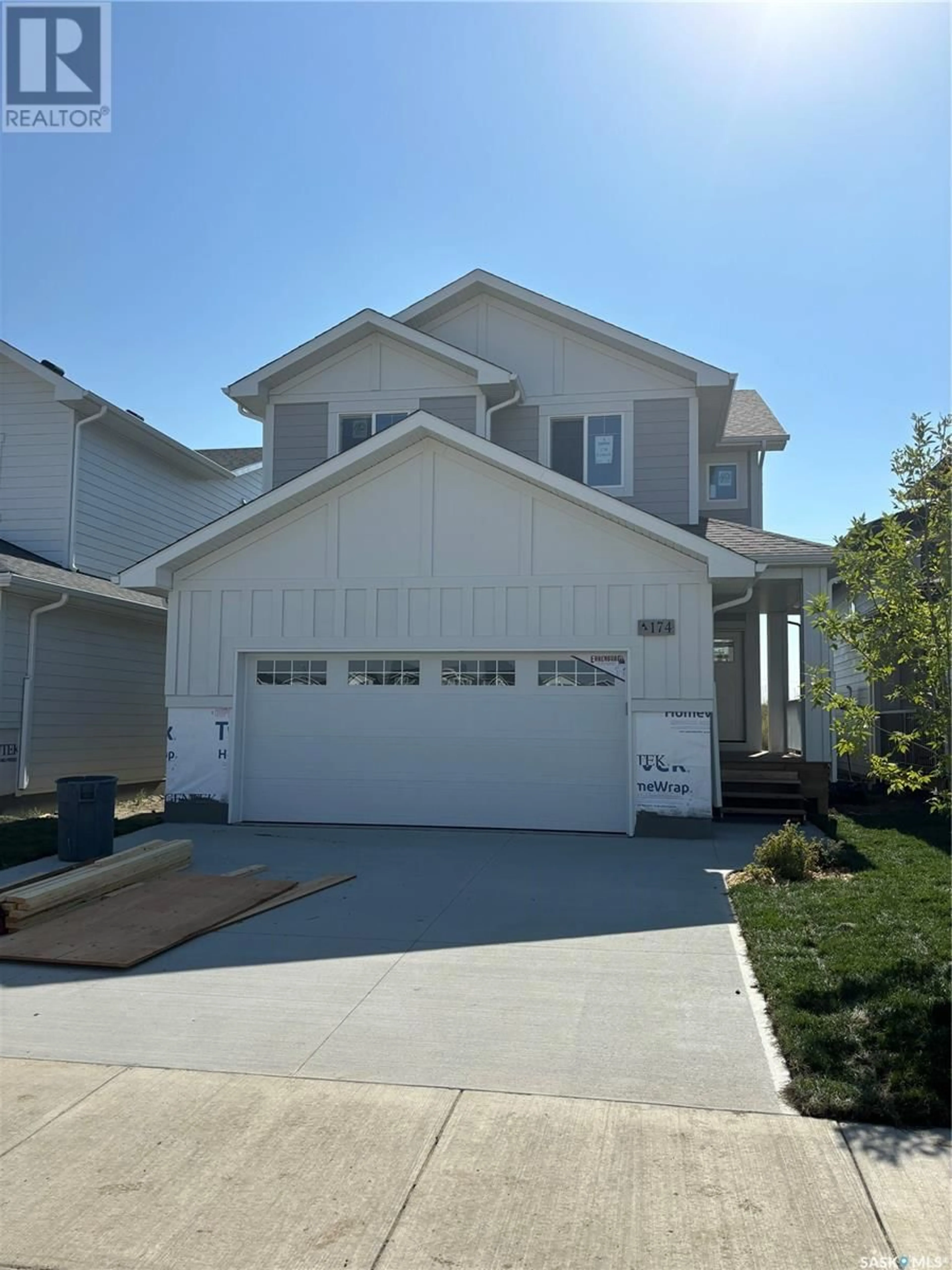 Frontside or backside of a home, the street view for 174 Kostiuk CRESCENT, Saskatoon Saskatchewan S7W0P6