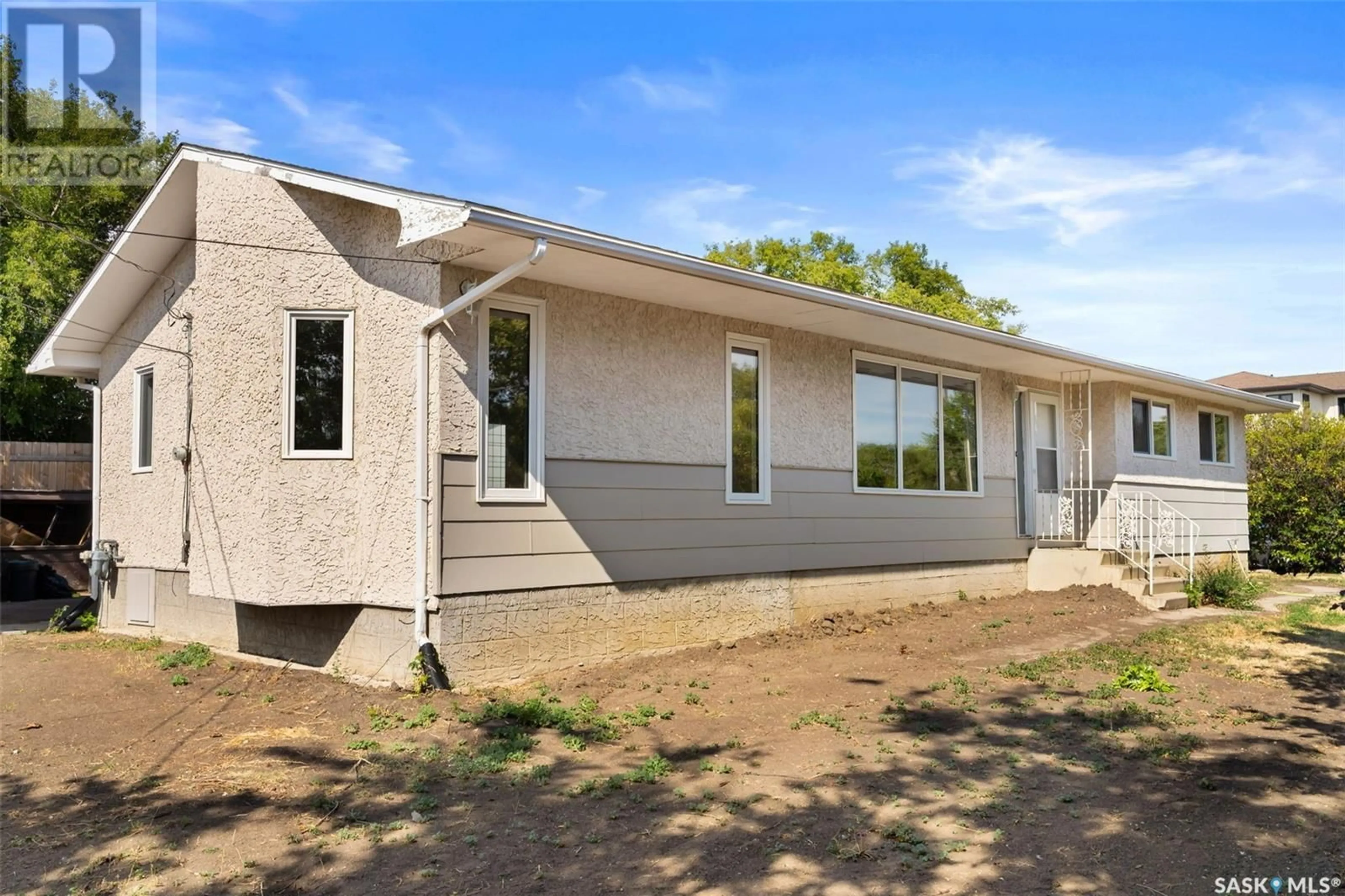 Frontside or backside of a home, the front or back of building for 202 7th STREET, Pilot Butte Saskatchewan S0G3Z0