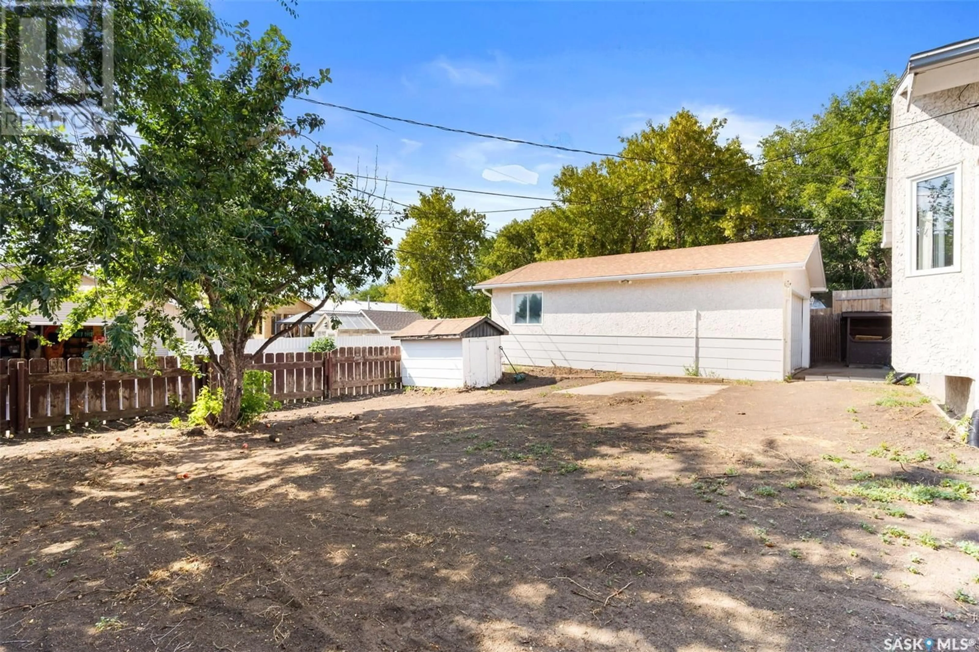 A pic from outside/outdoor area/front of a property/back of a property/a pic from drone, street for 202 7th STREET, Pilot Butte Saskatchewan S0G3Z0