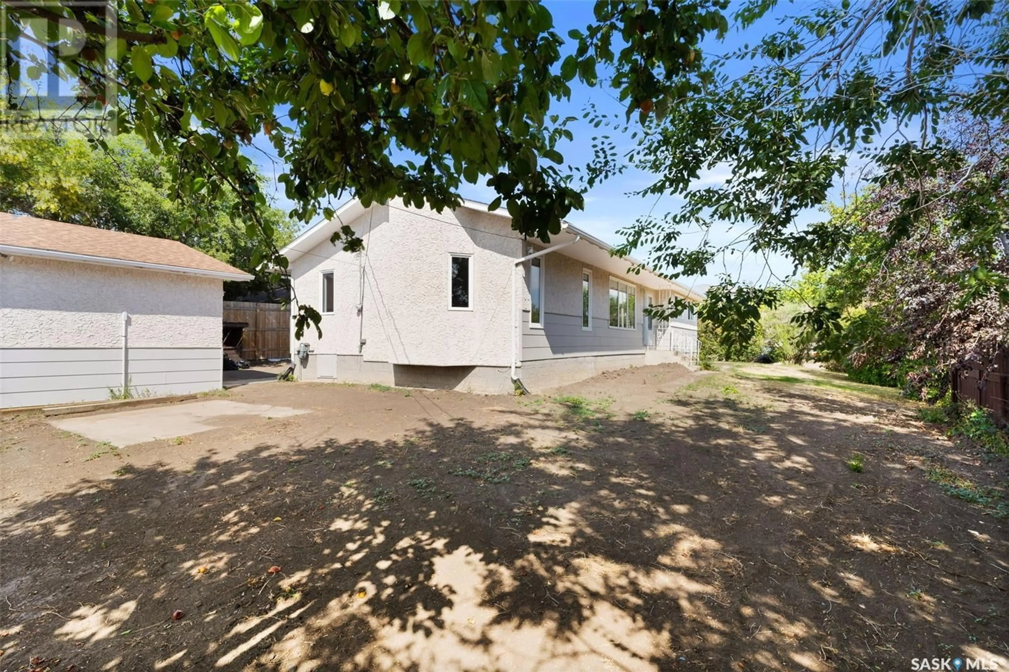 A pic from outside/outdoor area/front of a property/back of a property/a pic from drone, street for 202 7th STREET, Pilot Butte Saskatchewan S0G3Z0