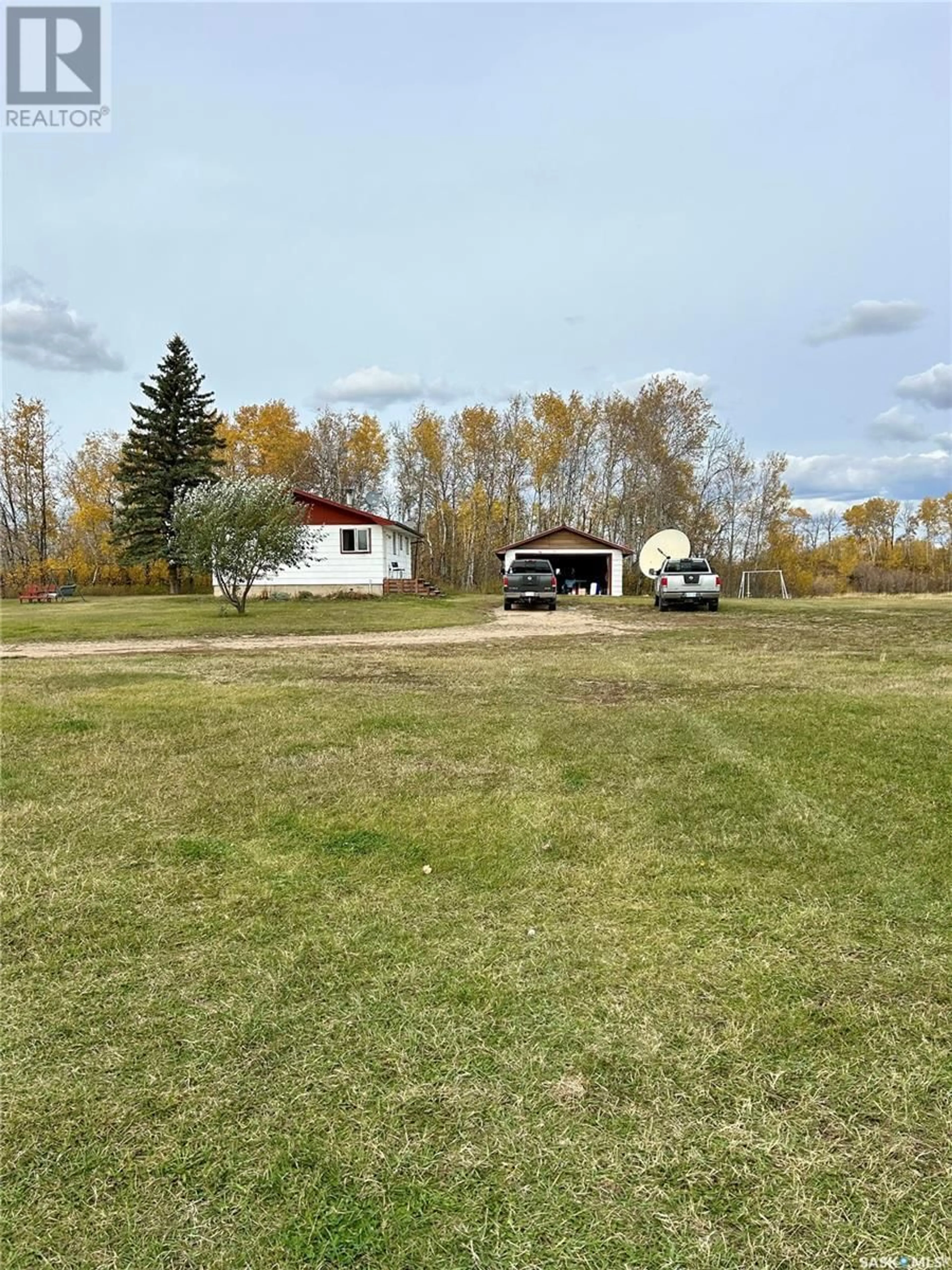 A pic from exterior of the house or condo, the fenced backyard for Hill Acreage, Porcupine Rm No. 395 Saskatchewan S0E1H0