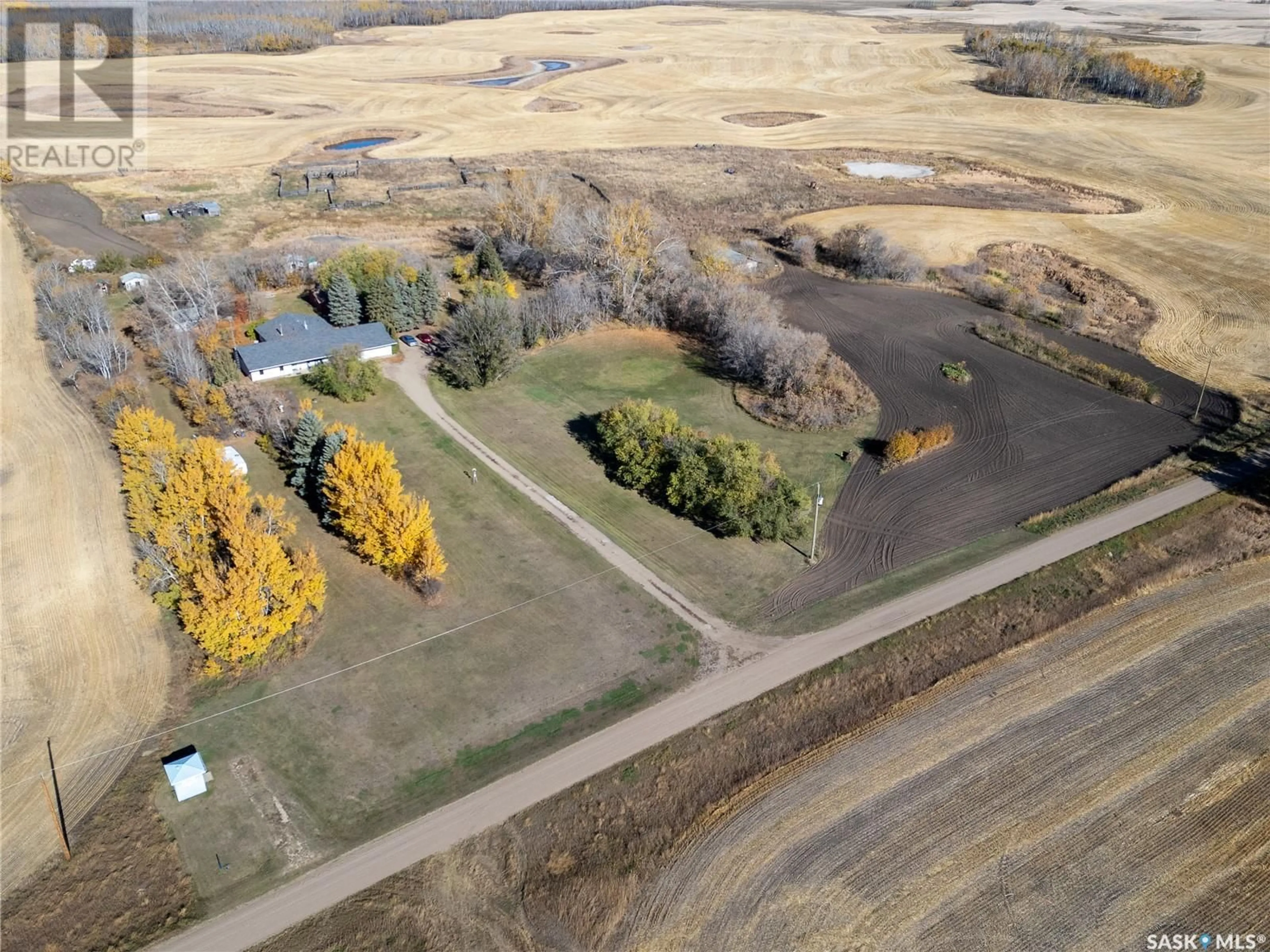 A pic from exterior of the house or condo, the fenced backyard for Rasmussen Acreage, Prince Albert Rm No. 461 Saskatchewan S6V5T1