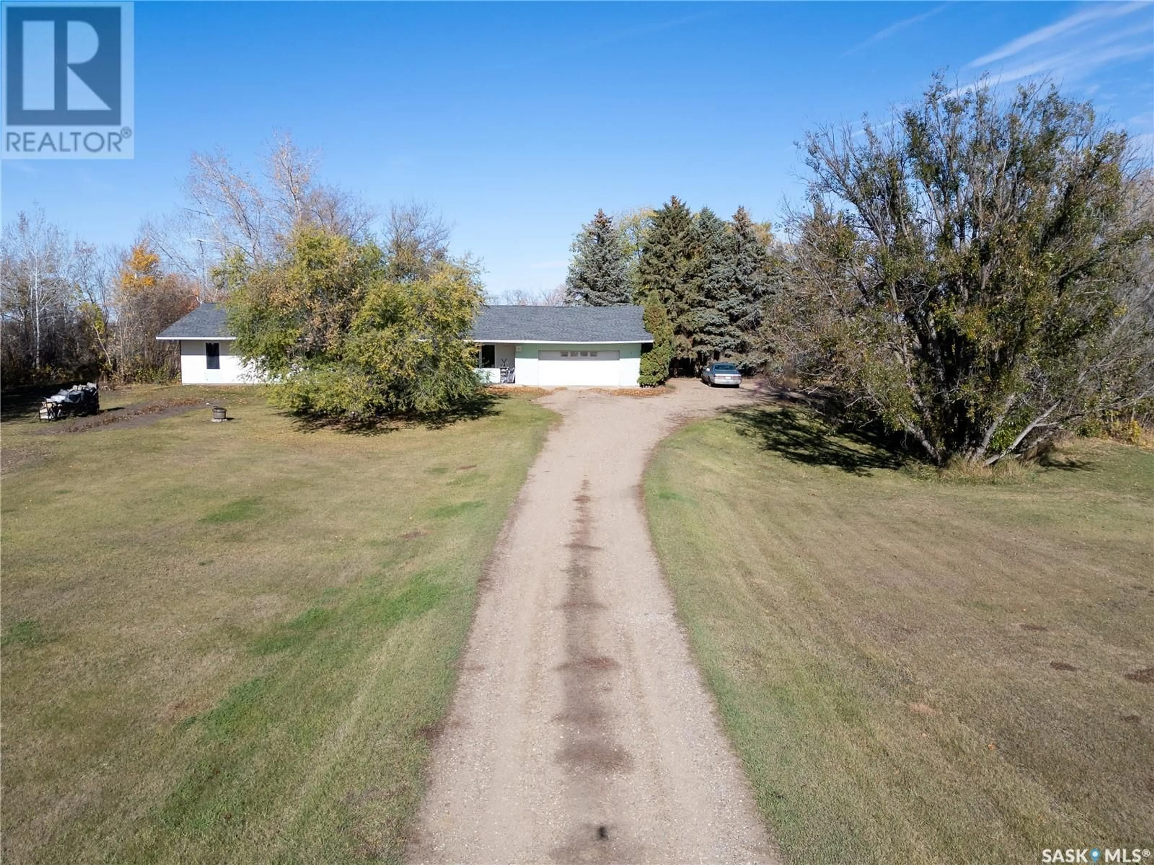 Frontside or backside of a home, the fenced backyard for Rasmussen Acreage, Prince Albert Rm No. 461 Saskatchewan S6V5T1