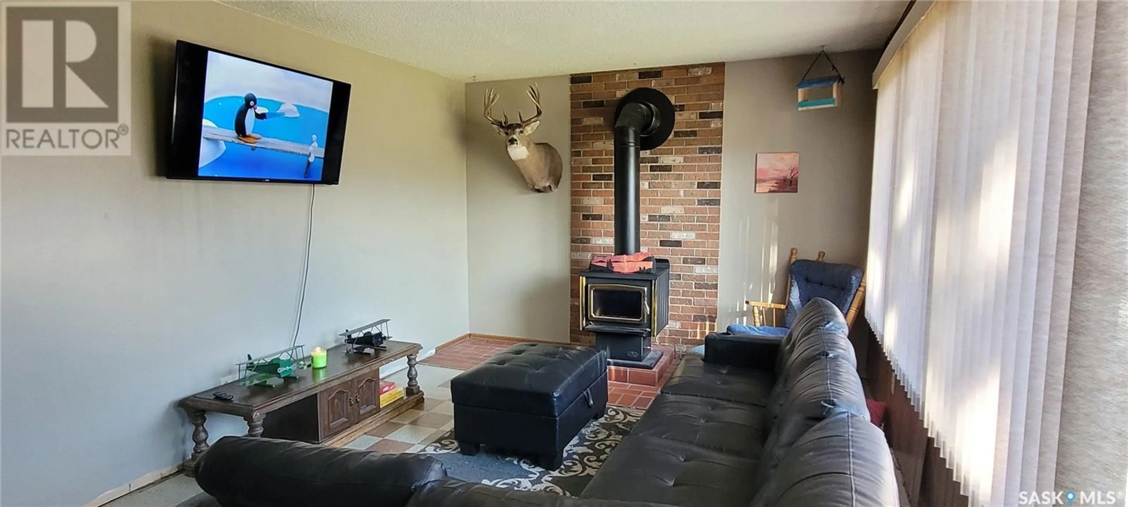 Living room with furniture, unknown for 311 5TH AVENUE, Loon Lake Saskatchewan S0M1L0