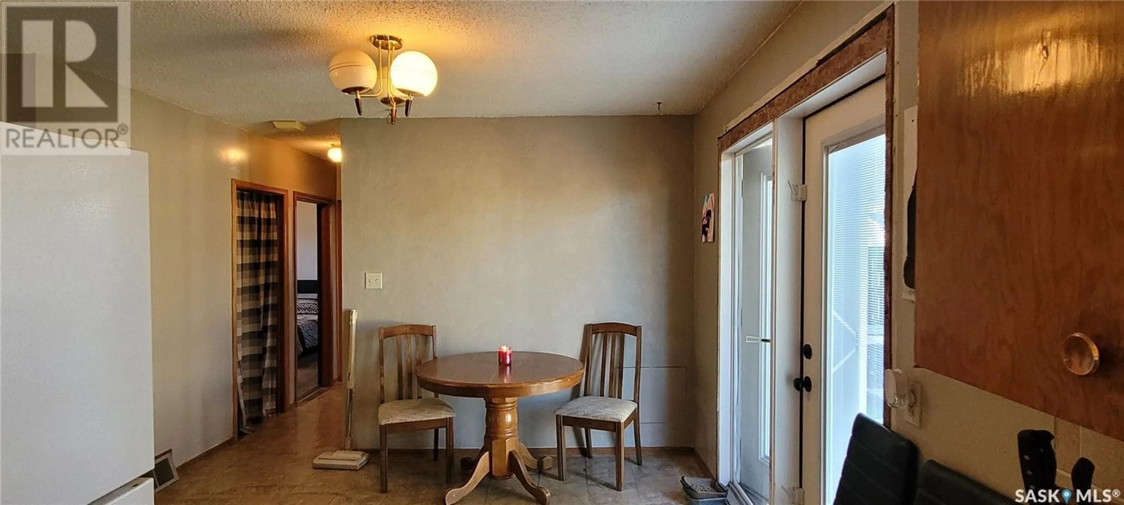 Dining room, wood floors, cottage for 311 5th AVENUE, Loon Lake Saskatchewan S0M1L0