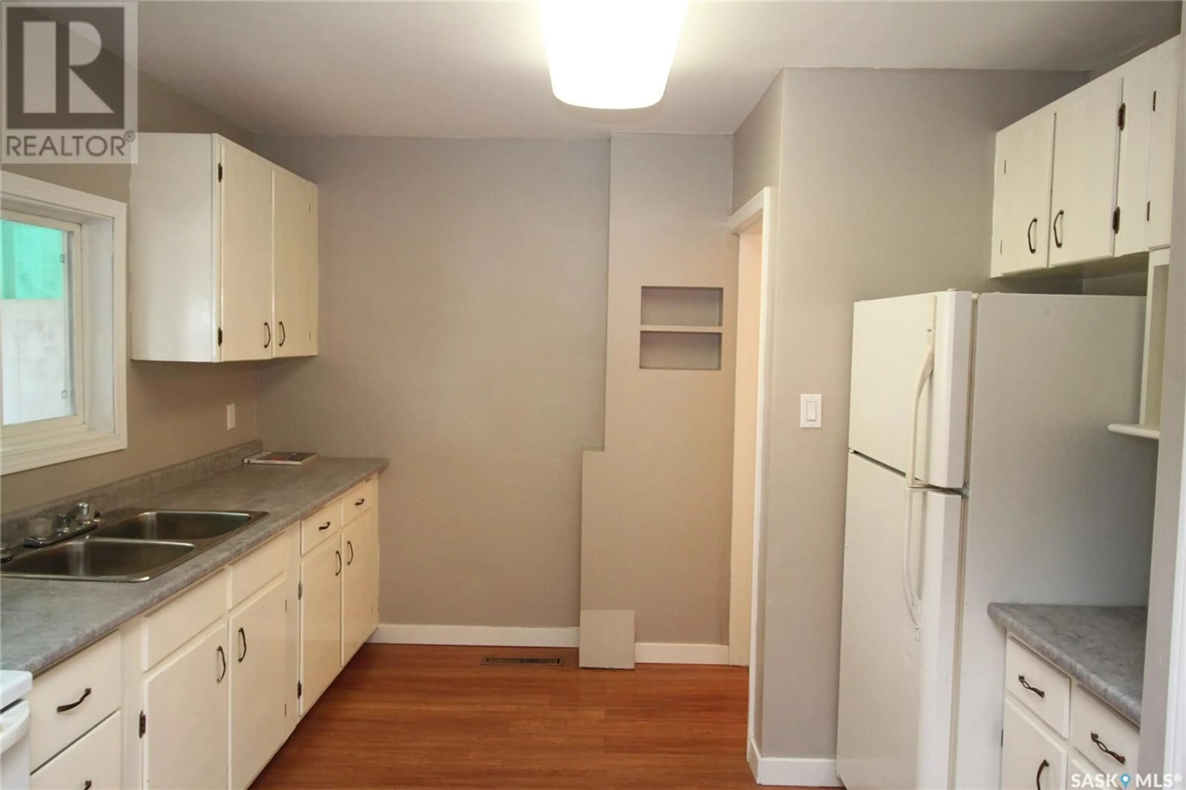 Standard kitchen, wood floors, cottage for 107 James STREET, Saskatoon Saskatchewan S7N3N3