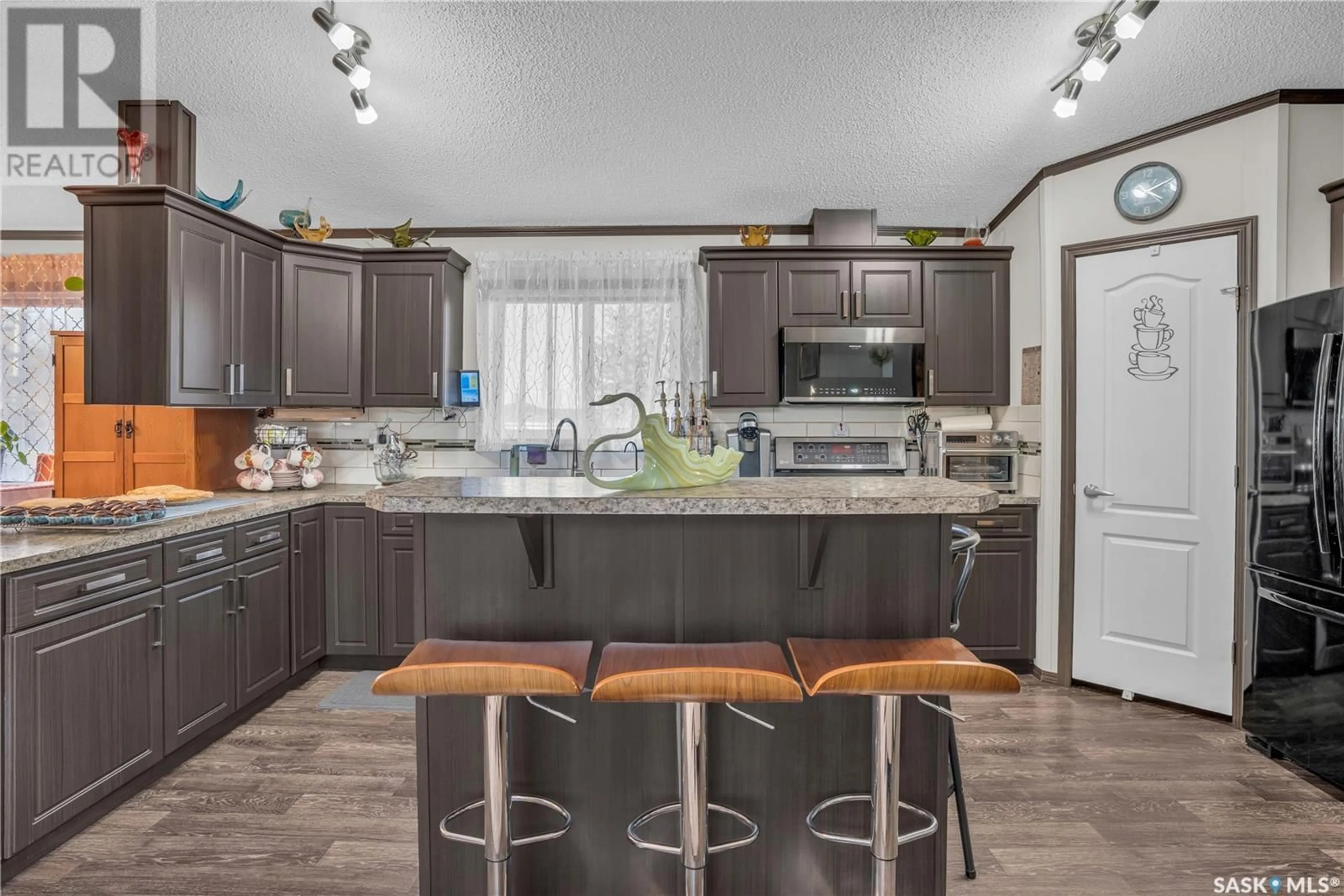 Open concept kitchen for 5 Garrettsee STREET, Duval Saskatchewan S0G1G0