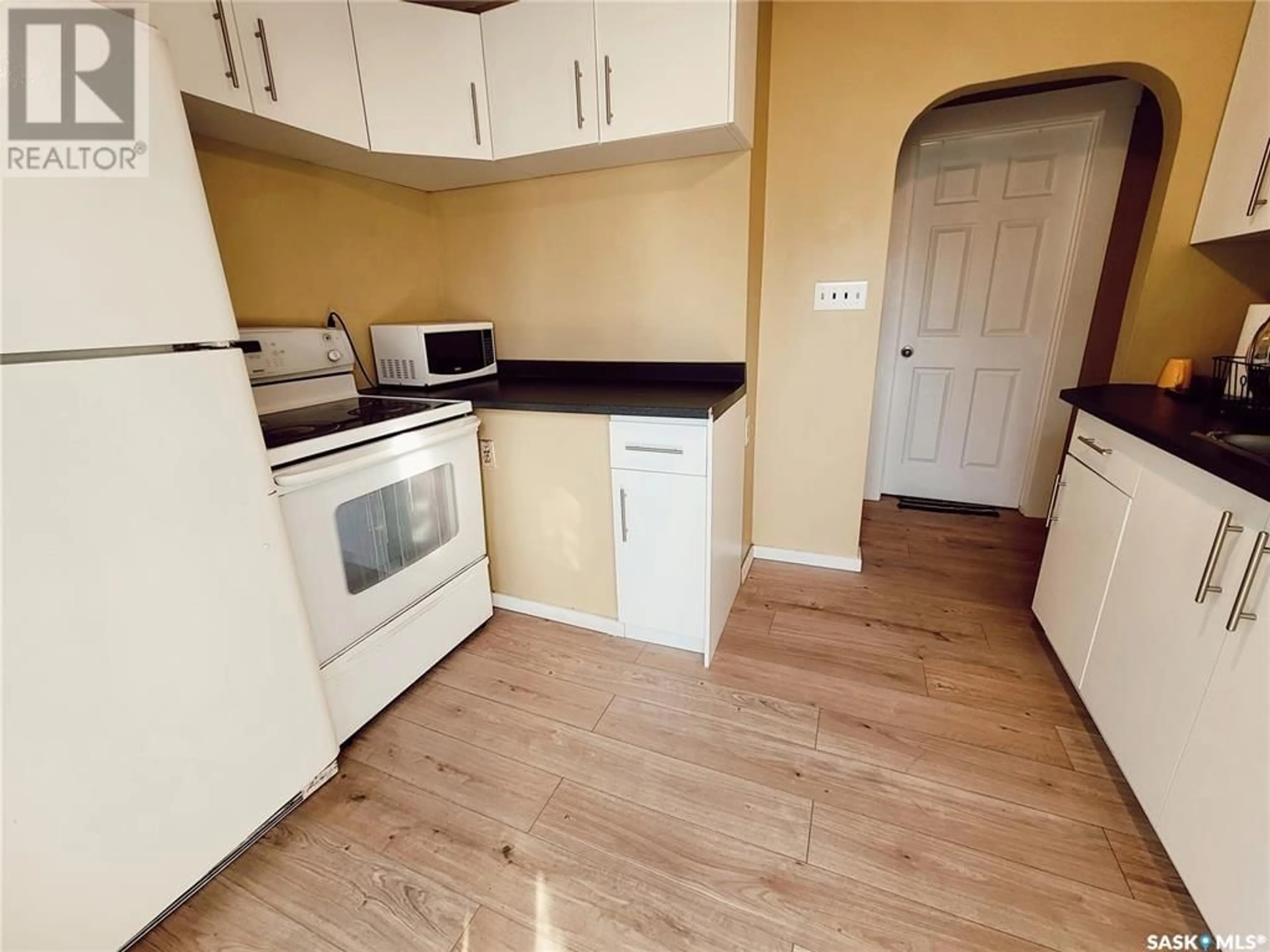 Standard kitchen, wood floors, cottage for 511 20th STREET E, Prince Albert Saskatchewan S6V1L4