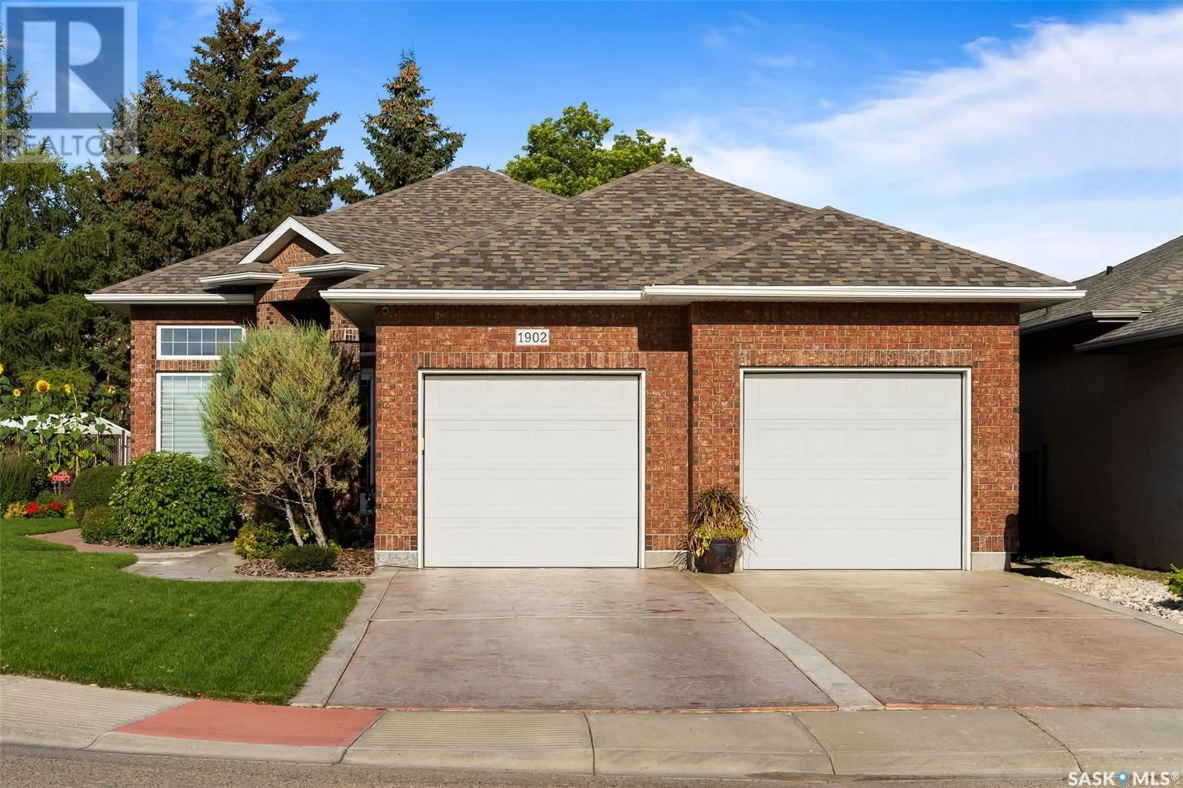 Home with brick exterior material for 1902 Laurier CRESCENT E, Regina Saskatchewan S4V0N8