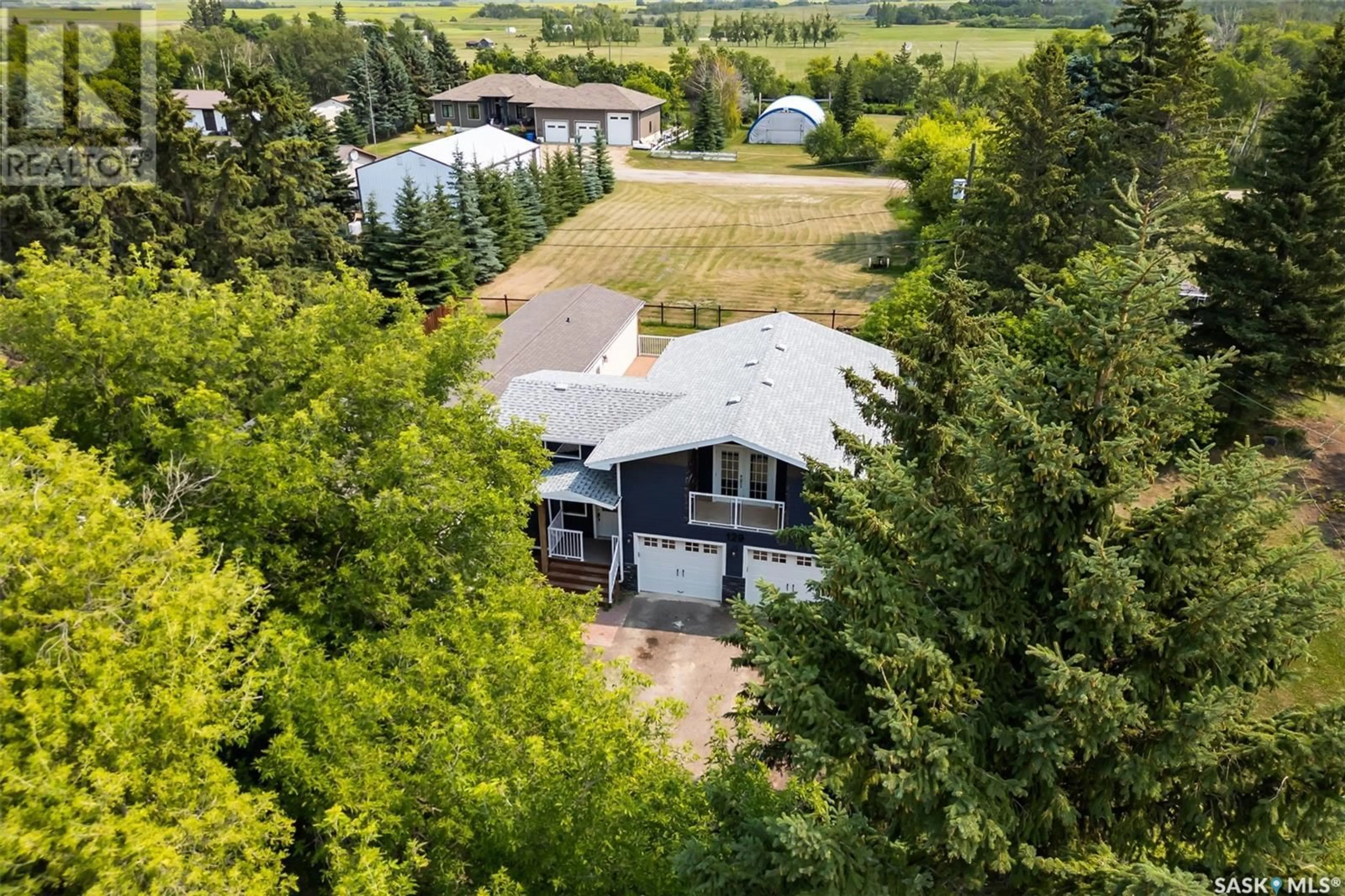 Frontside or backside of a home, the fenced backyard for 129 Grout STREET, Lemberg Saskatchewan S0A2B0