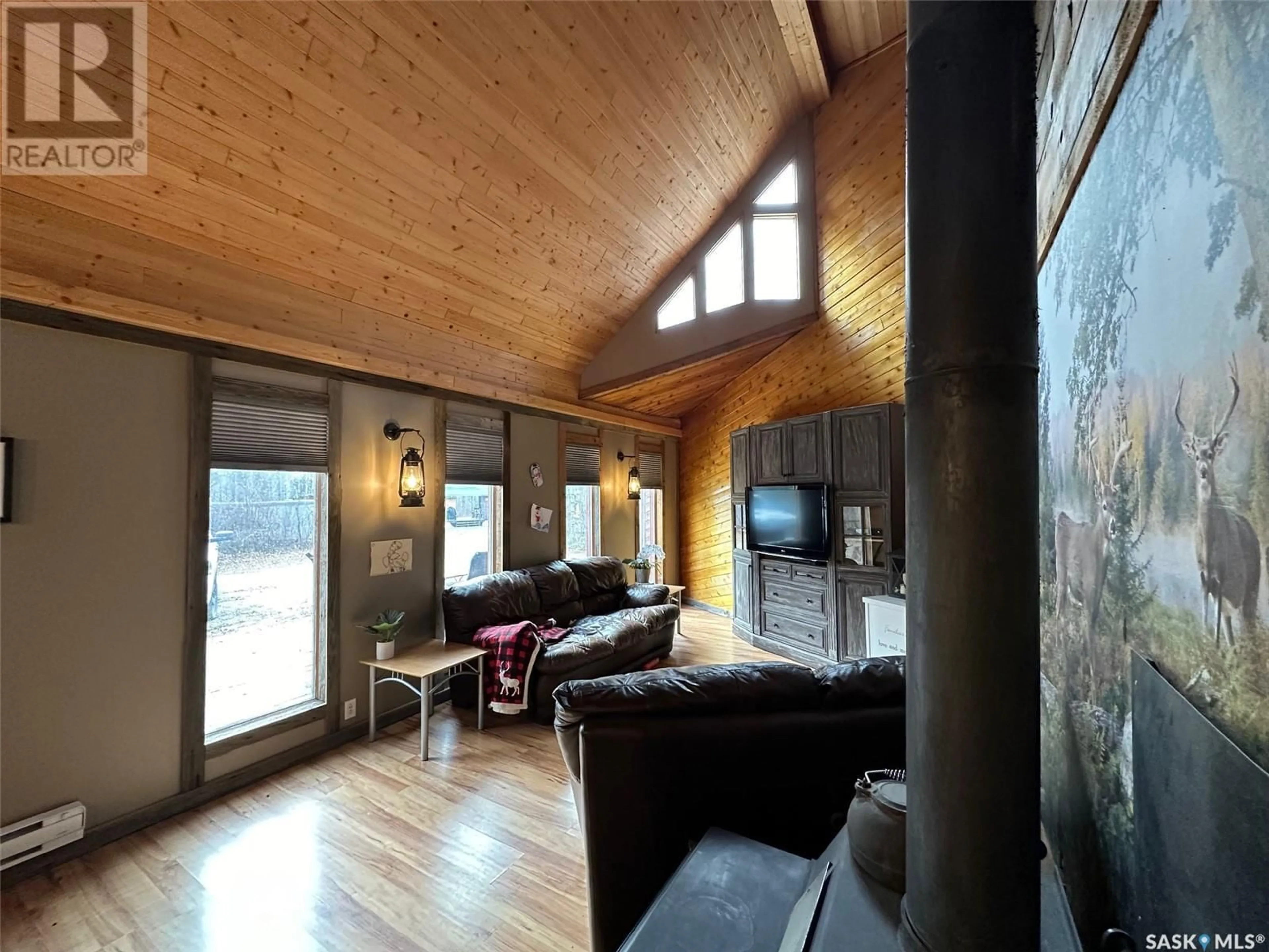 Living room, wood floors for Palagian Cabin Little Swan, Hudson Bay Saskatchewan S0E0Y0