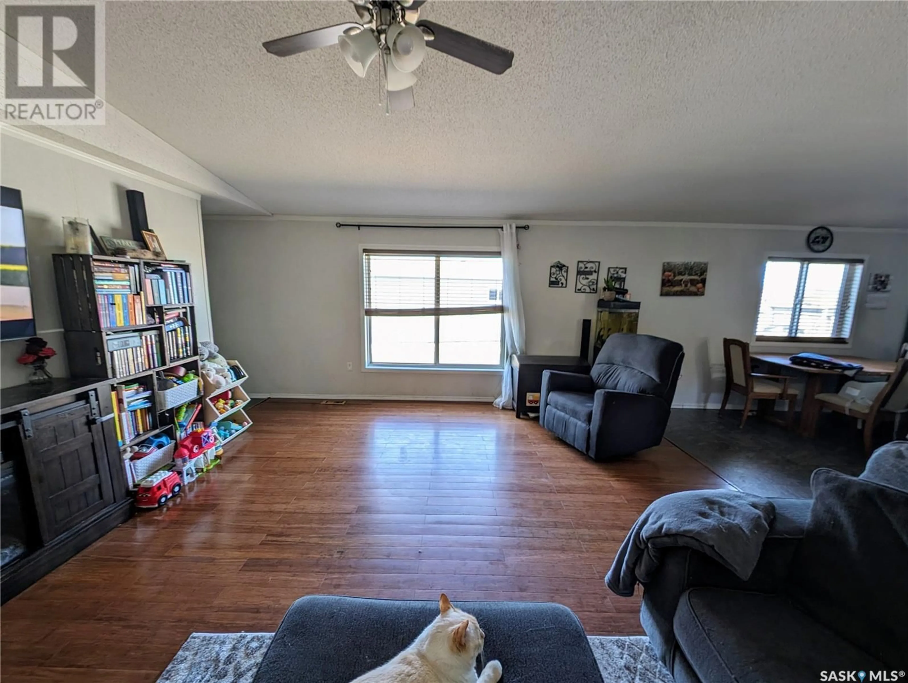 A pic of a room, wood floors for 438 Willow Park GREEN, Estevan Saskatchewan S4A2S1