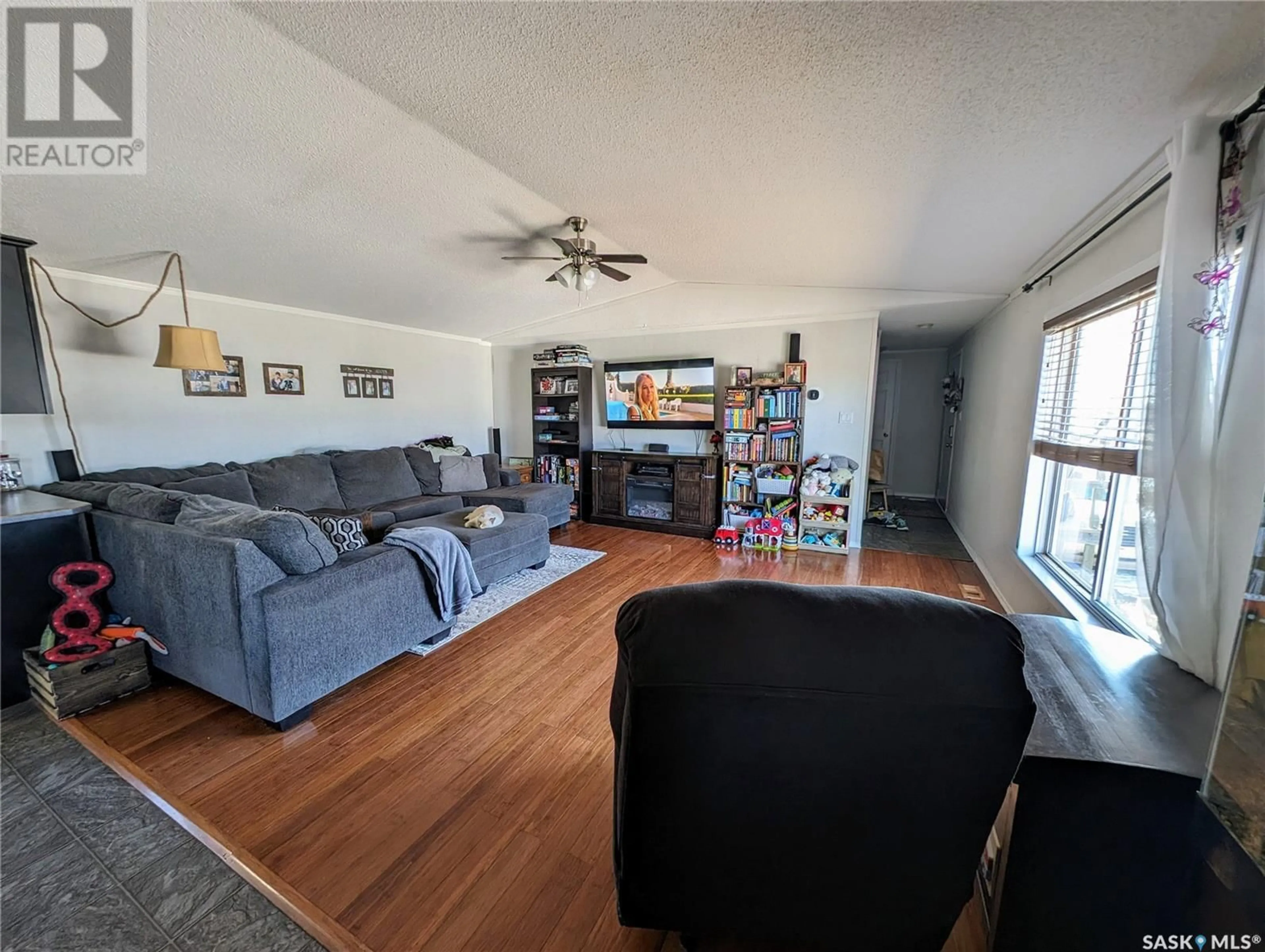 A pic of a room, wood floors for 438 Willow Park GREEN, Estevan Saskatchewan S4A2S1