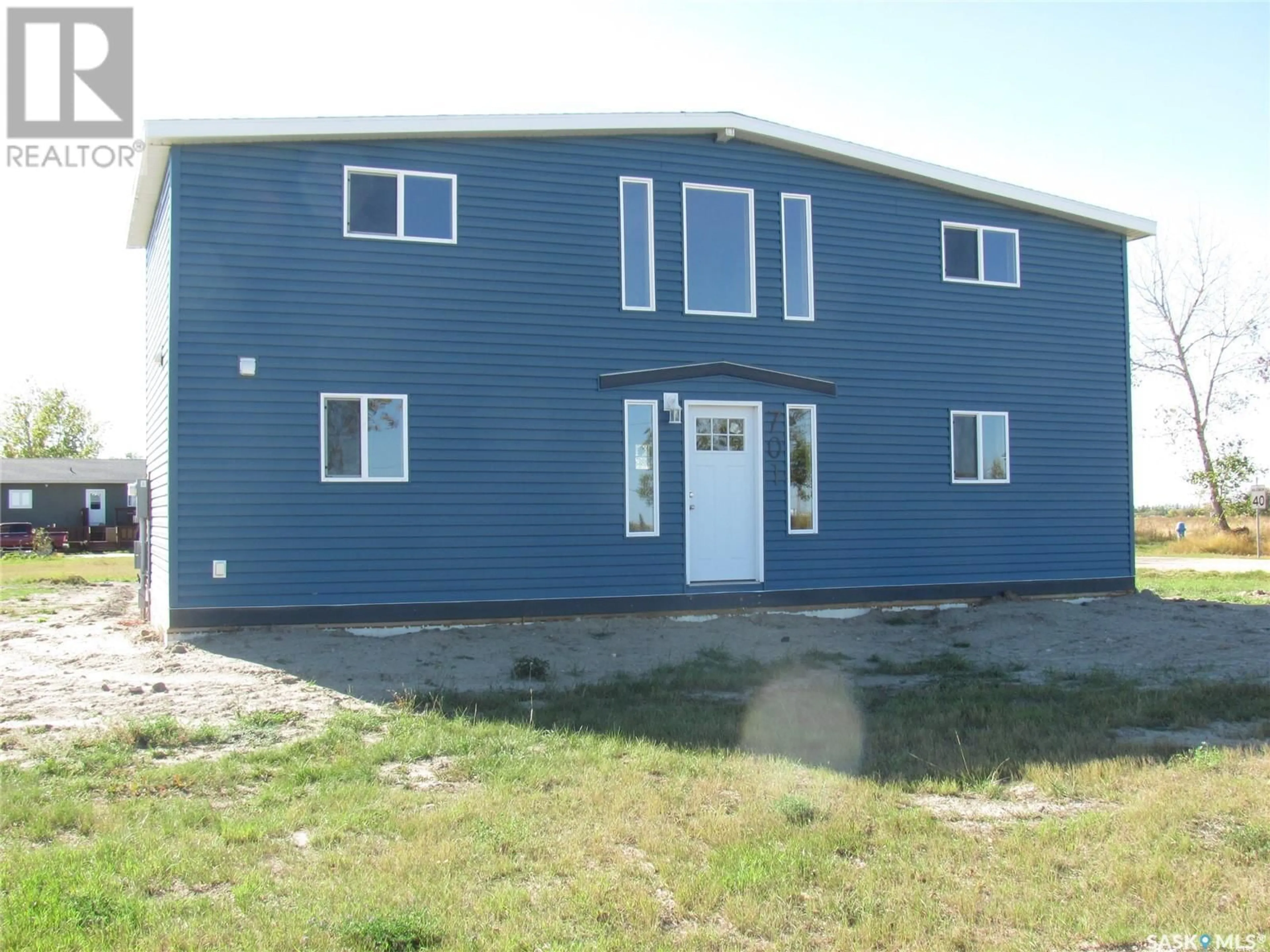 Frontside or backside of a home, the front or back of building for 701 Pfeffer AVENUE, Elbow Saskatchewan S0H1J0