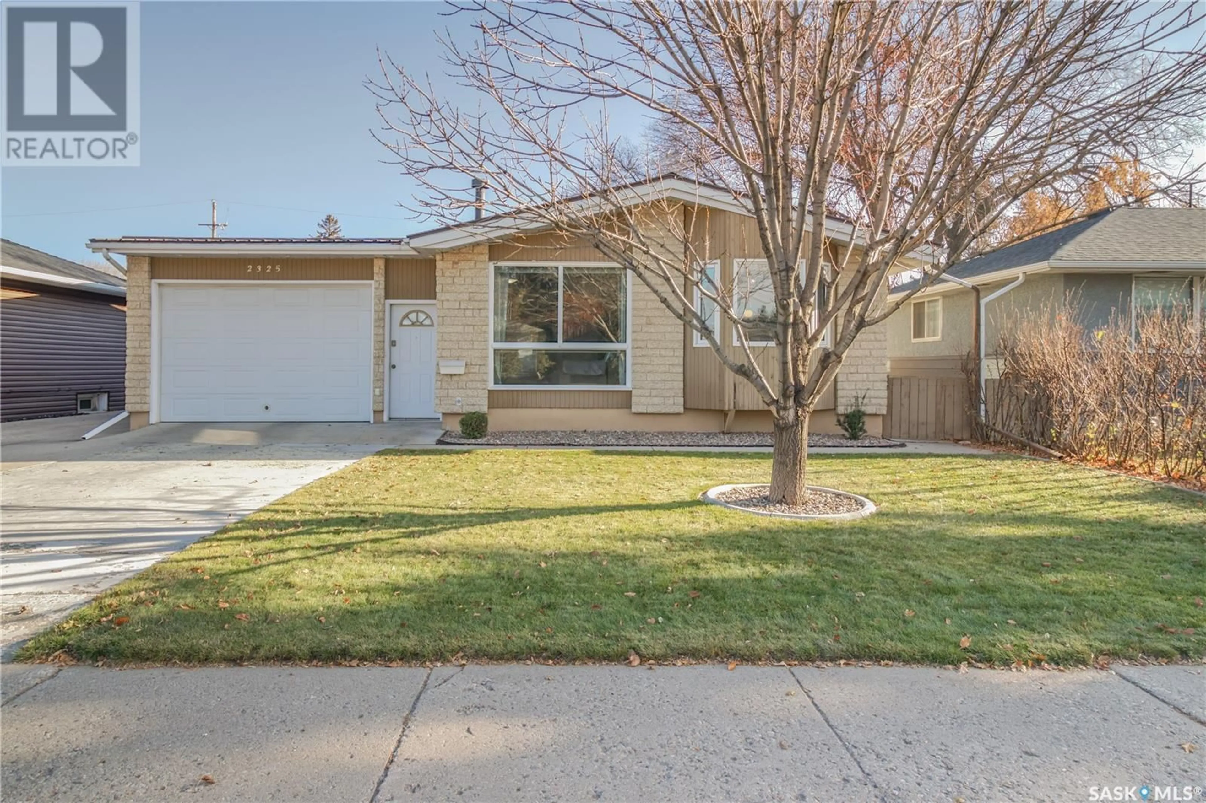 A pic from exterior of the house or condo, the street view for 2325 Clarence AVENUE S, Saskatoon Saskatchewan S7J1L8