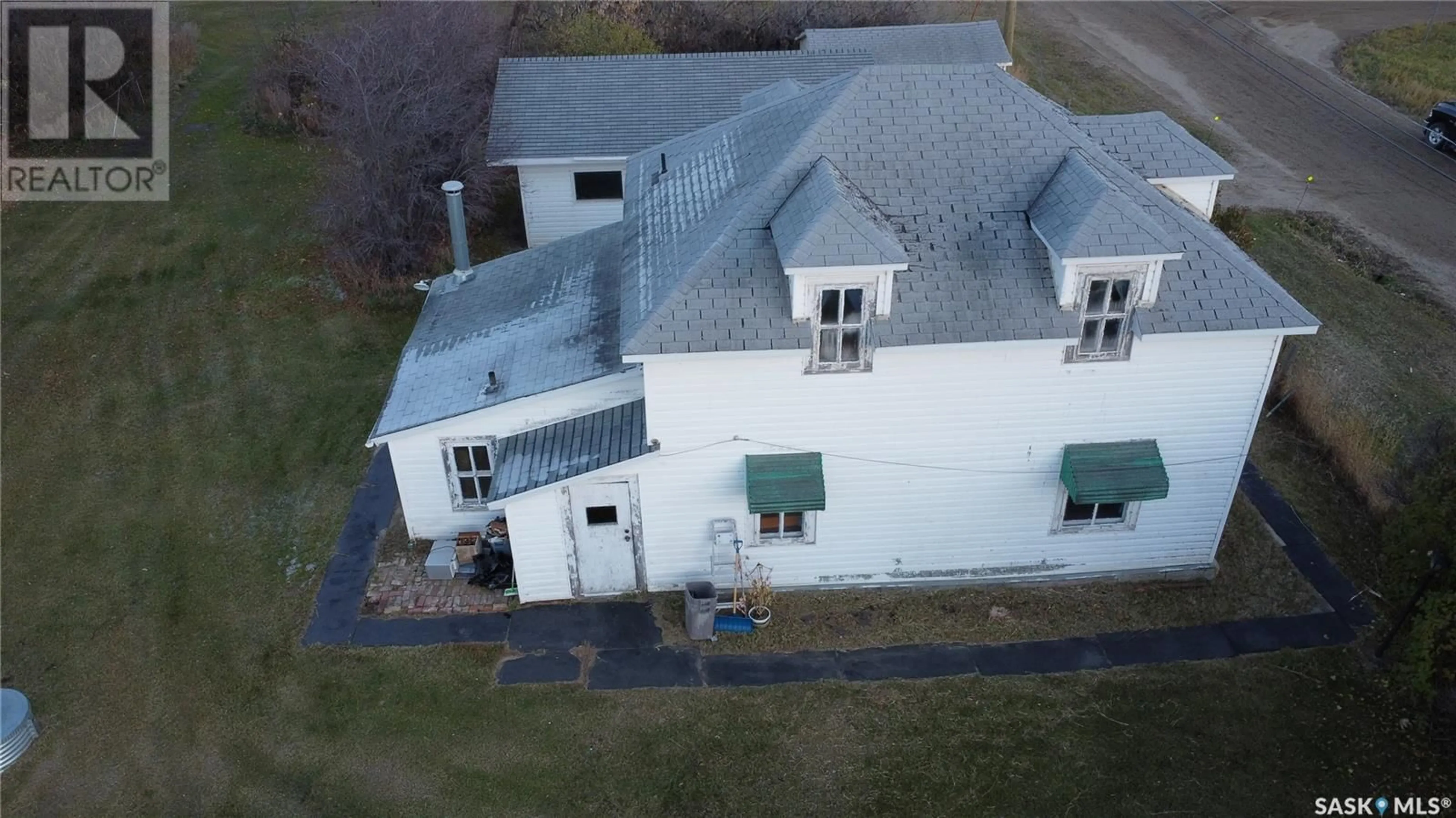 Frontside or backside of a home, the front or back of building for 912 3rd STREET E, Rosthern Saskatchewan S0K3R0