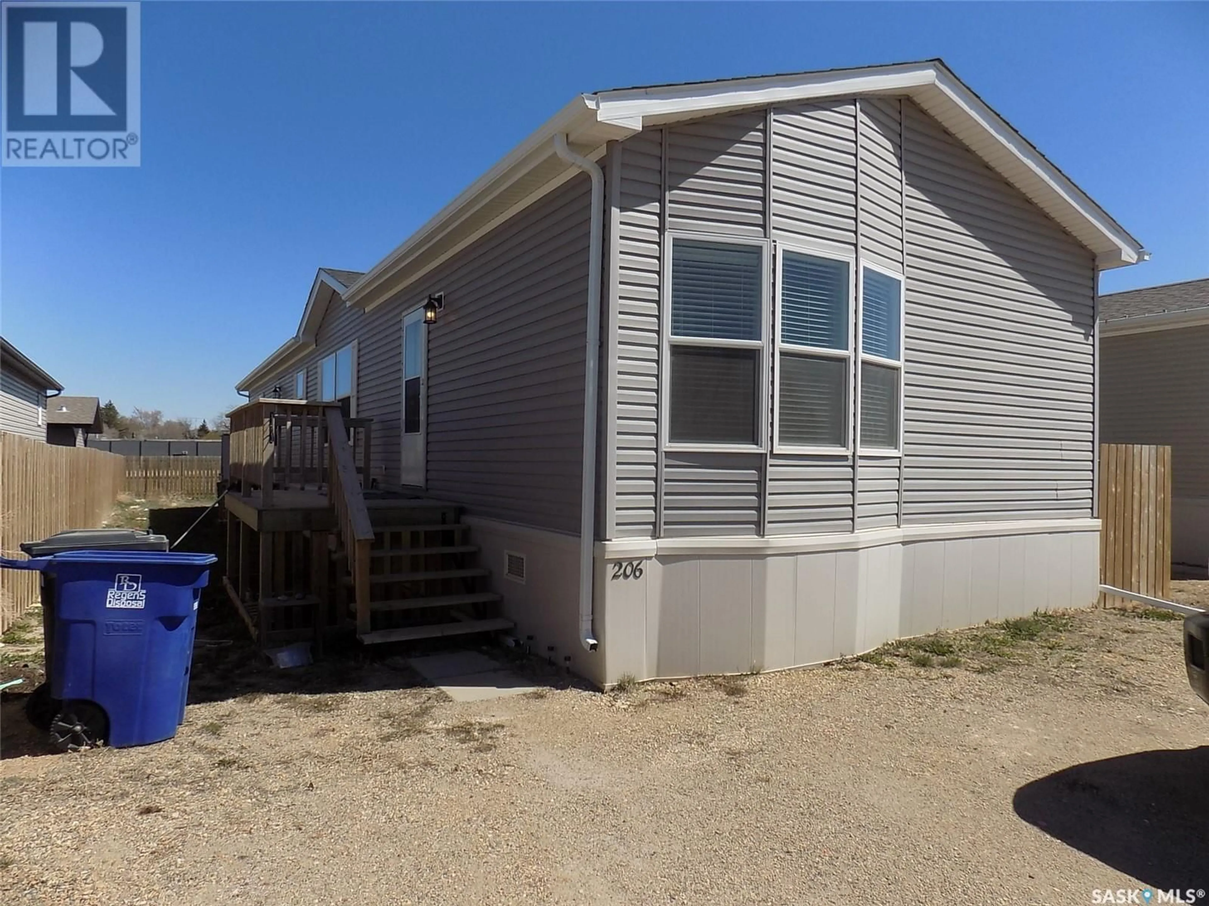 A pic from exterior of the house or condo, the front or back of building for 206 BROWNLEE STREET, Weyburn Saskatchewan S4H3P4