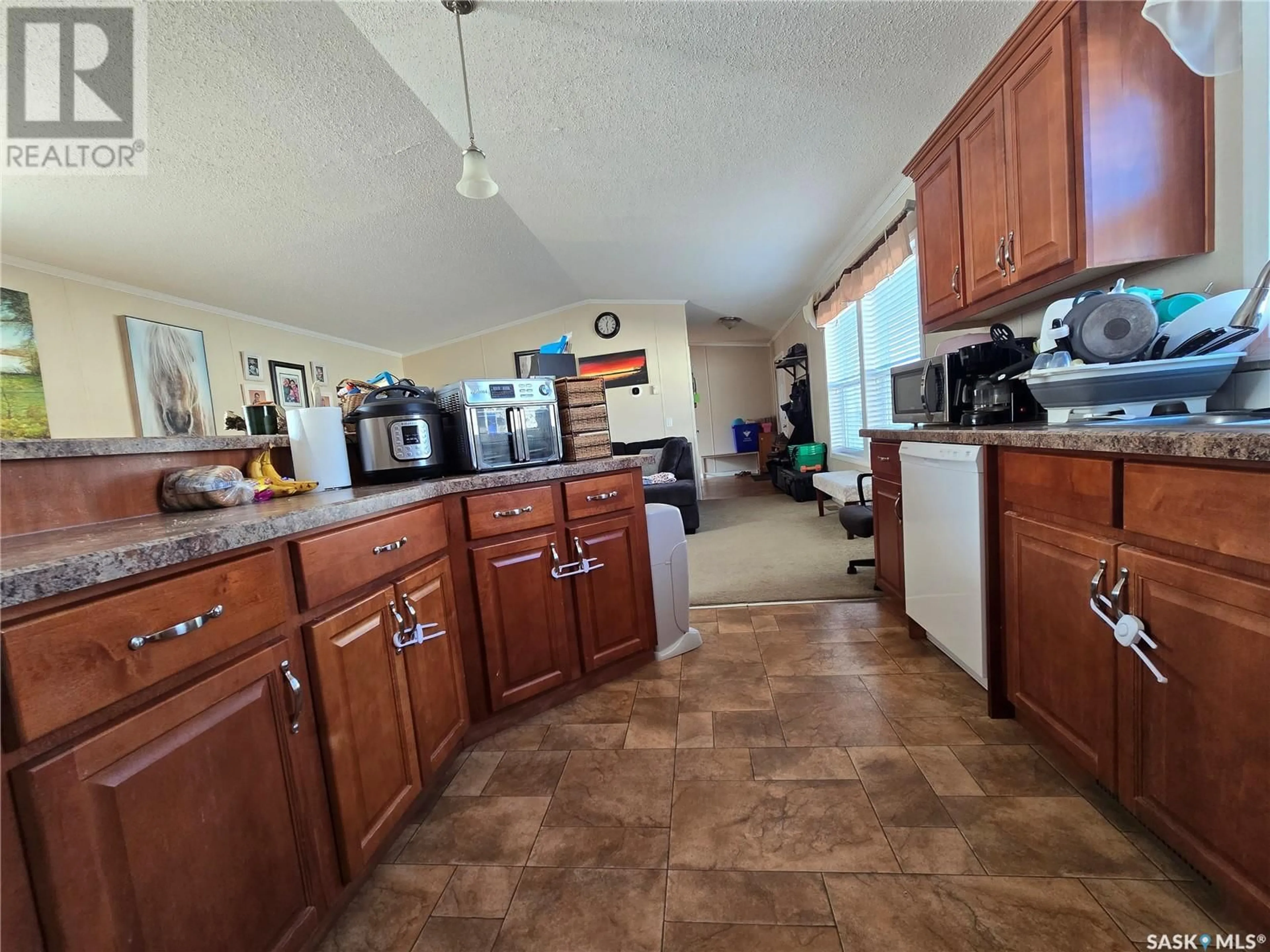 Kitchen, wood floors, cottage for 206 BROWNLEE STREET, Weyburn Saskatchewan S4H3P4