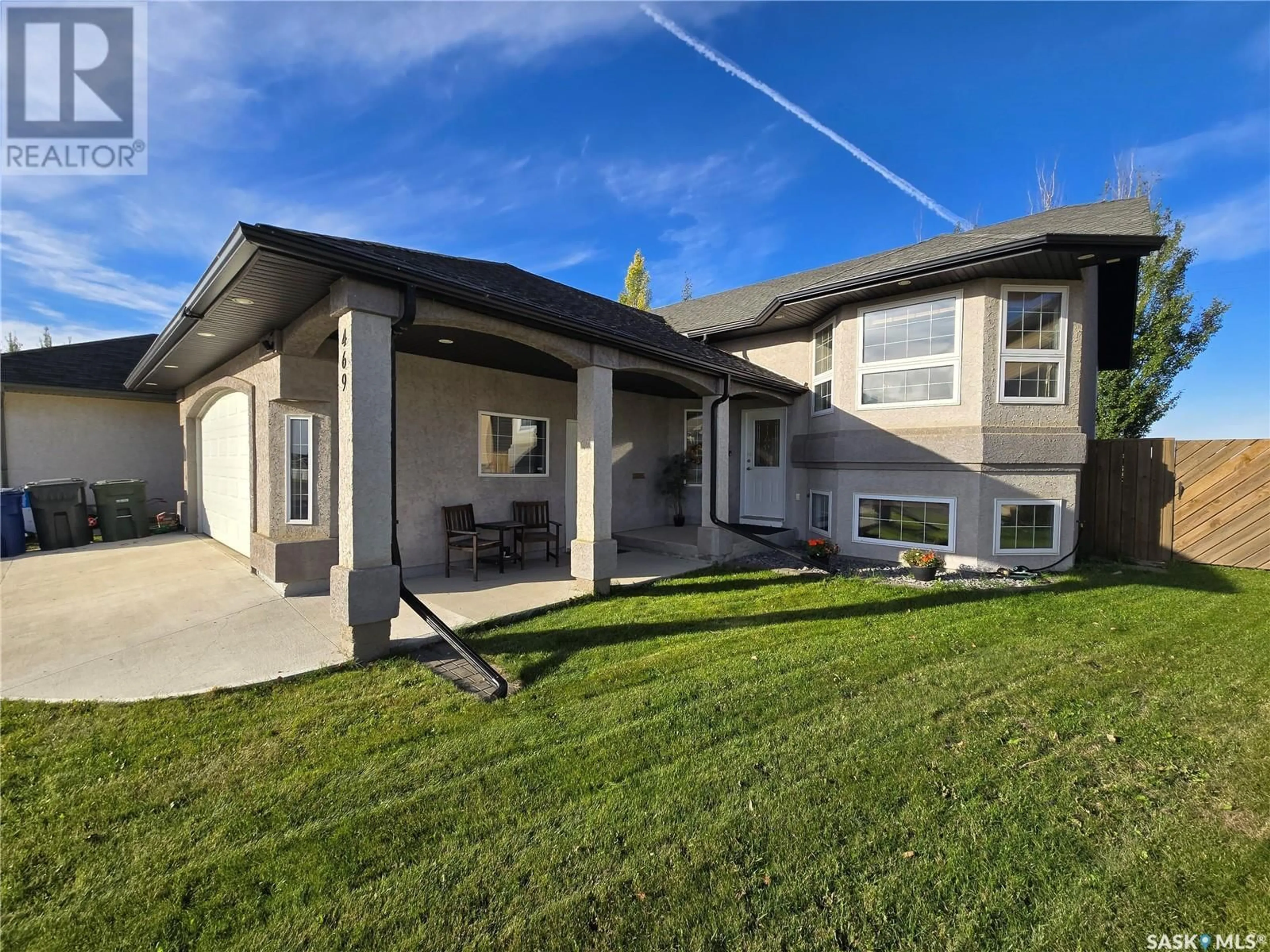 Frontside or backside of a home, the fenced backyard for 469 Brooklyn CRESCENT, Warman Saskatchewan S0K0A1