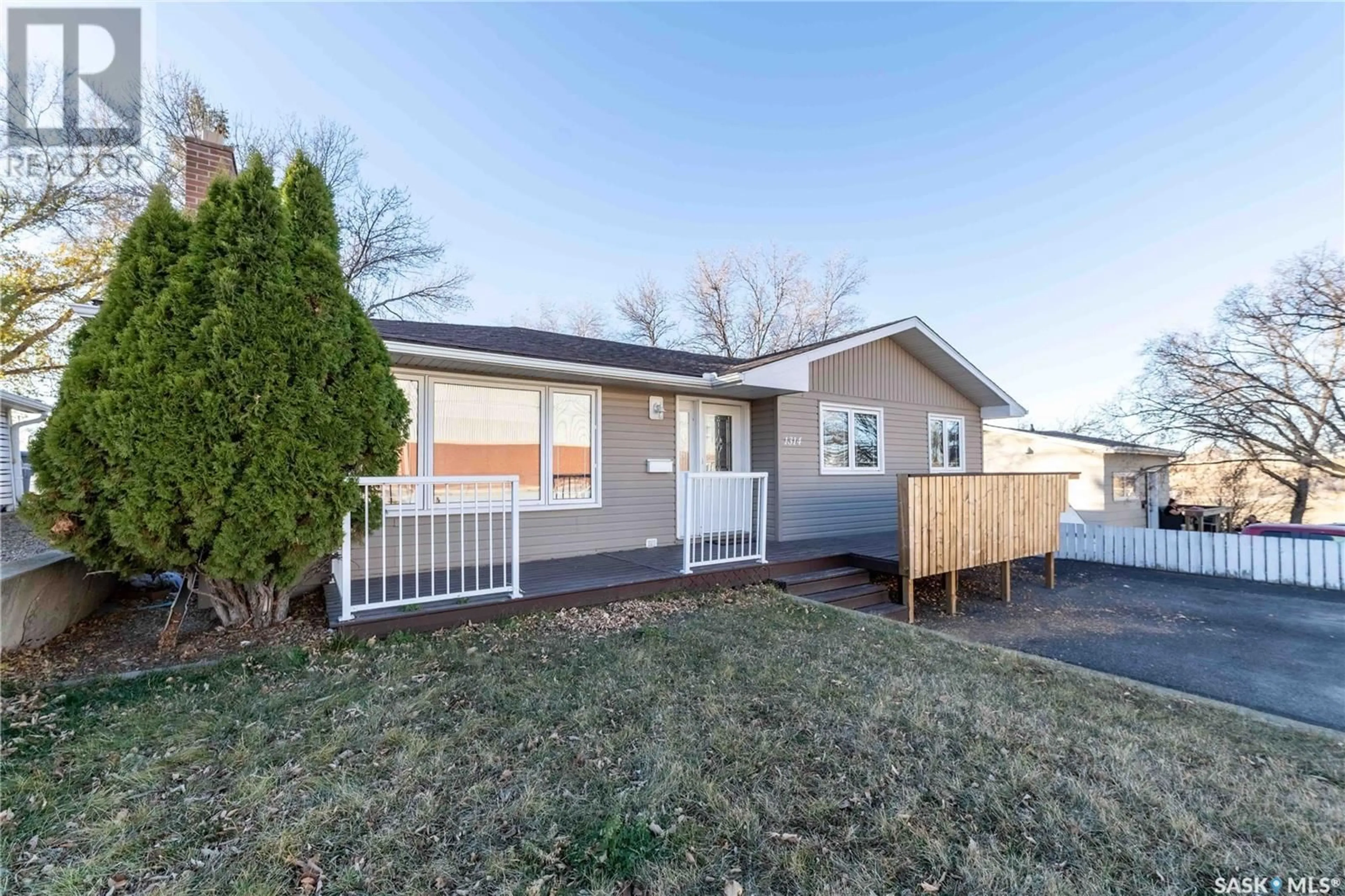 A pic from exterior of the house or condo, the fenced backyard for 1314 Henleaze AVENUE, Moose Jaw Saskatchewan S6H3W2